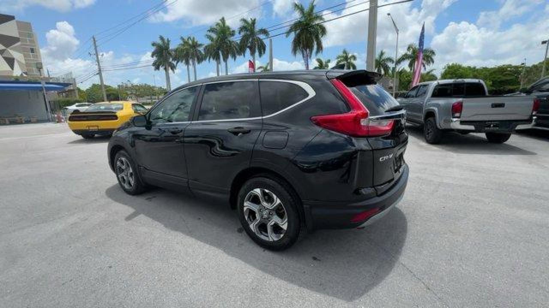 2017 Black Honda CR-V (2HKRW2H51HH) with an 4 1.5 L engine, Variable transmission, located at 27610 S Dixie Hwy, Homestead, FL, 33032, (305) 749-2348, 25.510241, -80.438301 - KBB.com 10 Most Awarded Brands. Scores 33 Highway MPG and 27 City MPG! This Honda CR-V boasts a Intercooled Turbo Regular Unleaded I-4 1.5 L/91 engine powering this Variable transmission. Wheels: 18 Alloy, Valet Function, Urethane Gear Shifter Material.* This Honda CR-V Features the Following Option - Photo#2