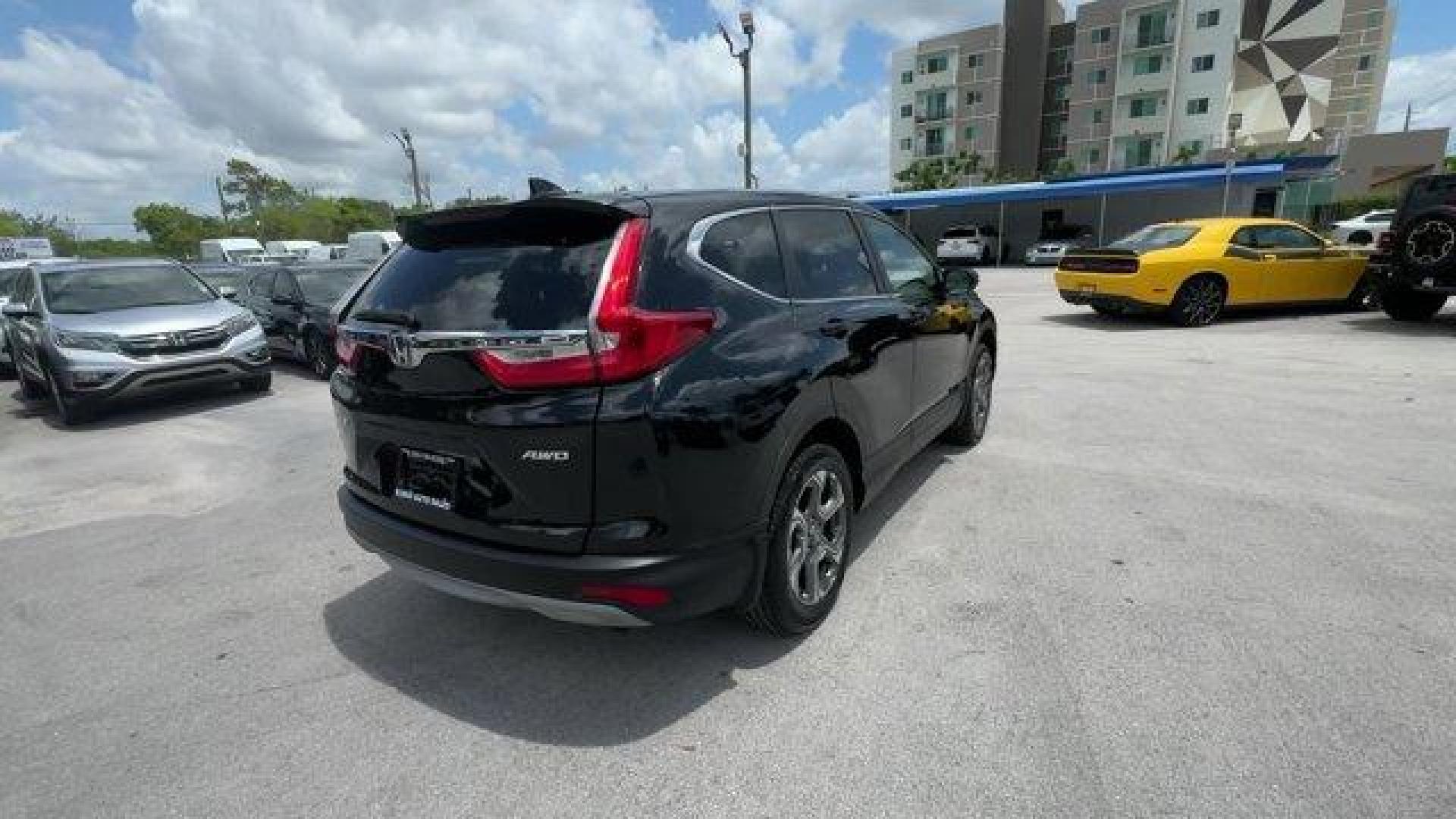 2017 Black Honda CR-V (2HKRW2H51HH) with an 4 1.5 L engine, Variable transmission, located at 27610 S Dixie Hwy, Homestead, FL, 33032, (305) 749-2348, 25.510241, -80.438301 - KBB.com 10 Most Awarded Brands. Scores 33 Highway MPG and 27 City MPG! This Honda CR-V boasts a Intercooled Turbo Regular Unleaded I-4 1.5 L/91 engine powering this Variable transmission. Wheels: 18 Alloy, Valet Function, Urethane Gear Shifter Material.* This Honda CR-V Features the Following Option - Photo#4
