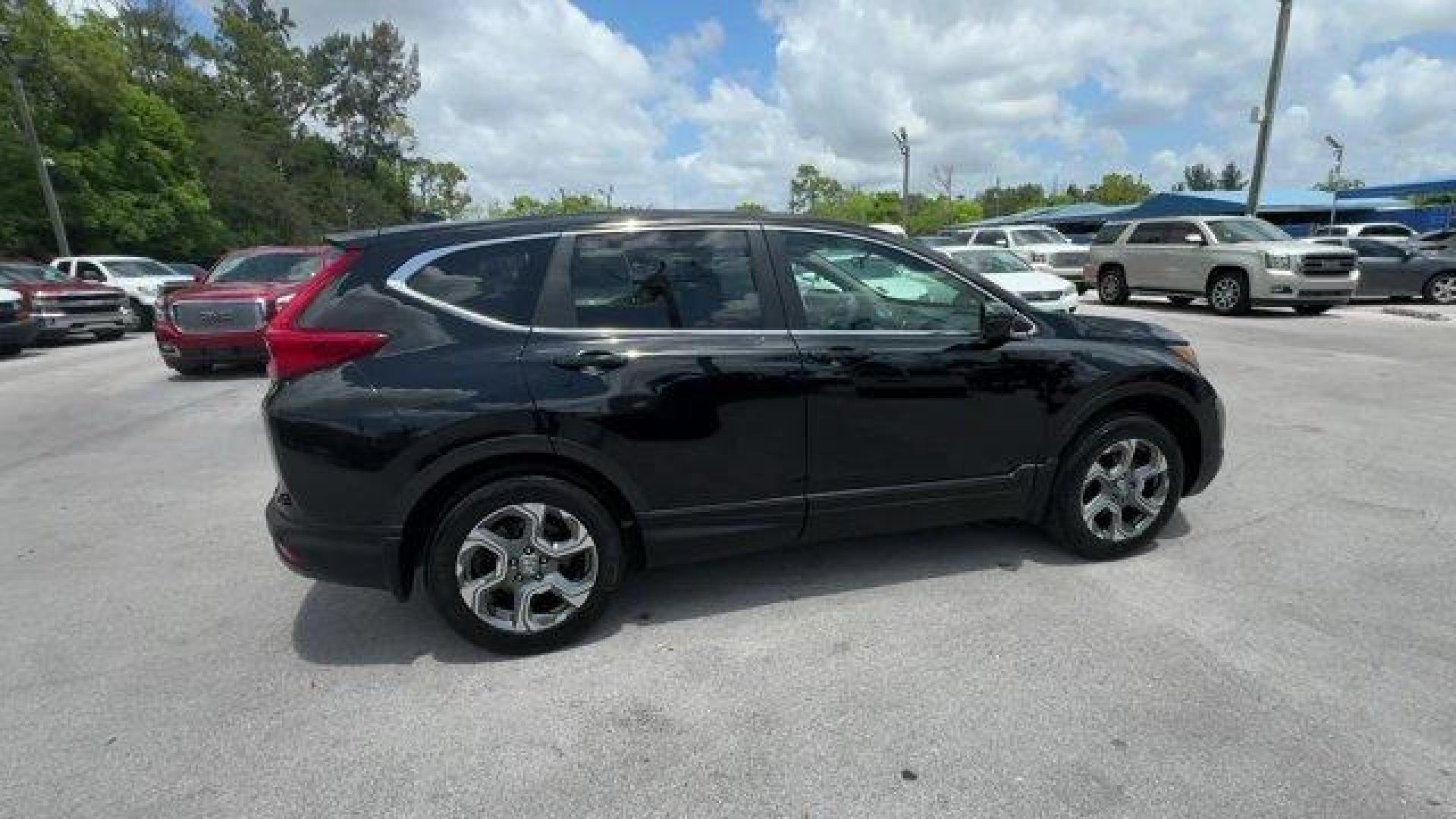 2017 Black Honda CR-V (2HKRW2H51HH) with an 4 1.5 L engine, Variable transmission, located at 27610 S Dixie Hwy, Homestead, FL, 33032, (305) 749-2348, 25.510241, -80.438301 - KBB.com 10 Most Awarded Brands. Scores 33 Highway MPG and 27 City MPG! This Honda CR-V boasts a Intercooled Turbo Regular Unleaded I-4 1.5 L/91 engine powering this Variable transmission. Wheels: 18 Alloy, Valet Function, Urethane Gear Shifter Material.* This Honda CR-V Features the Following Option - Photo#5