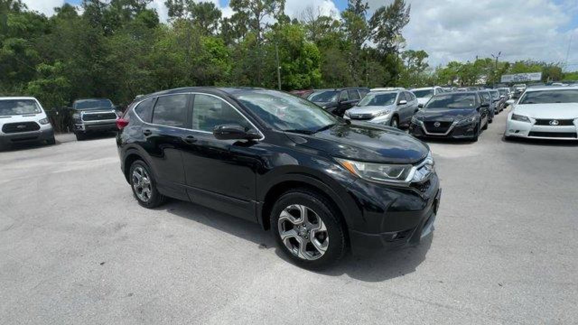 2017 Black Honda CR-V (2HKRW2H51HH) with an 4 1.5 L engine, Variable transmission, located at 27610 S Dixie Hwy, Homestead, FL, 33032, (305) 749-2348, 25.510241, -80.438301 - KBB.com 10 Most Awarded Brands. Scores 33 Highway MPG and 27 City MPG! This Honda CR-V boasts a Intercooled Turbo Regular Unleaded I-4 1.5 L/91 engine powering this Variable transmission. Wheels: 18 Alloy, Valet Function, Urethane Gear Shifter Material.* This Honda CR-V Features the Following Option - Photo#6