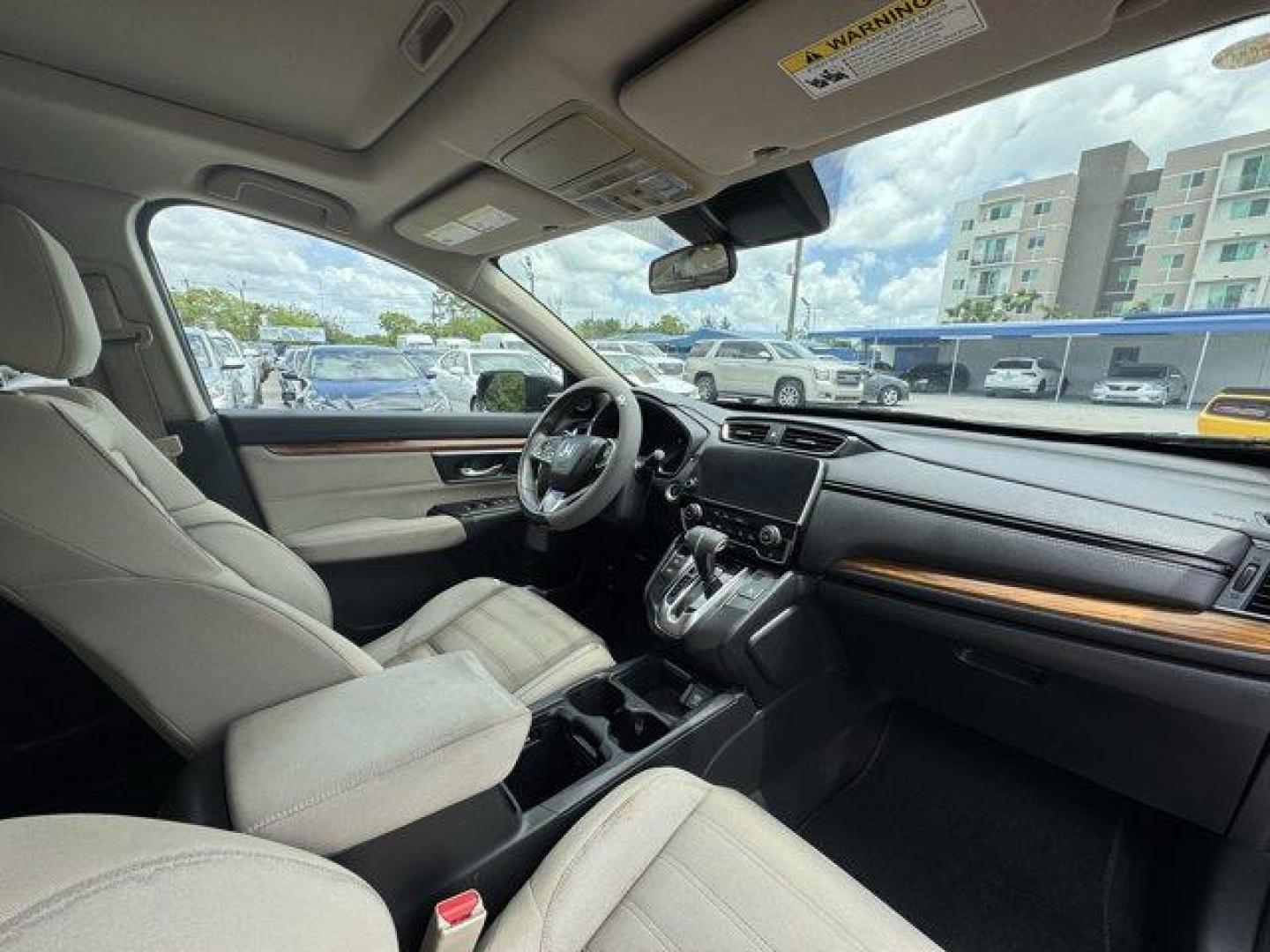 2017 Black Honda CR-V (2HKRW2H51HH) with an 4 1.5 L engine, Variable transmission, located at 27610 S Dixie Hwy, Homestead, FL, 33032, (305) 749-2348, 25.510241, -80.438301 - KBB.com 10 Most Awarded Brands. Scores 33 Highway MPG and 27 City MPG! This Honda CR-V boasts a Intercooled Turbo Regular Unleaded I-4 1.5 L/91 engine powering this Variable transmission. Wheels: 18 Alloy, Valet Function, Urethane Gear Shifter Material.* This Honda CR-V Features the Following Option - Photo#12