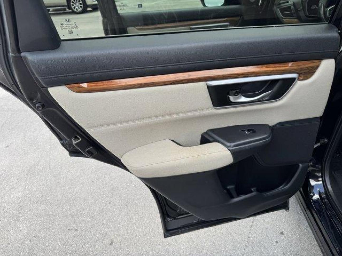 2017 Black Honda CR-V (2HKRW2H51HH) with an 4 1.5 L engine, Variable transmission, located at 27610 S Dixie Hwy, Homestead, FL, 33032, (305) 749-2348, 25.510241, -80.438301 - KBB.com 10 Most Awarded Brands. Scores 33 Highway MPG and 27 City MPG! This Honda CR-V boasts a Intercooled Turbo Regular Unleaded I-4 1.5 L/91 engine powering this Variable transmission. Wheels: 18 Alloy, Valet Function, Urethane Gear Shifter Material.* This Honda CR-V Features the Following Option - Photo#16