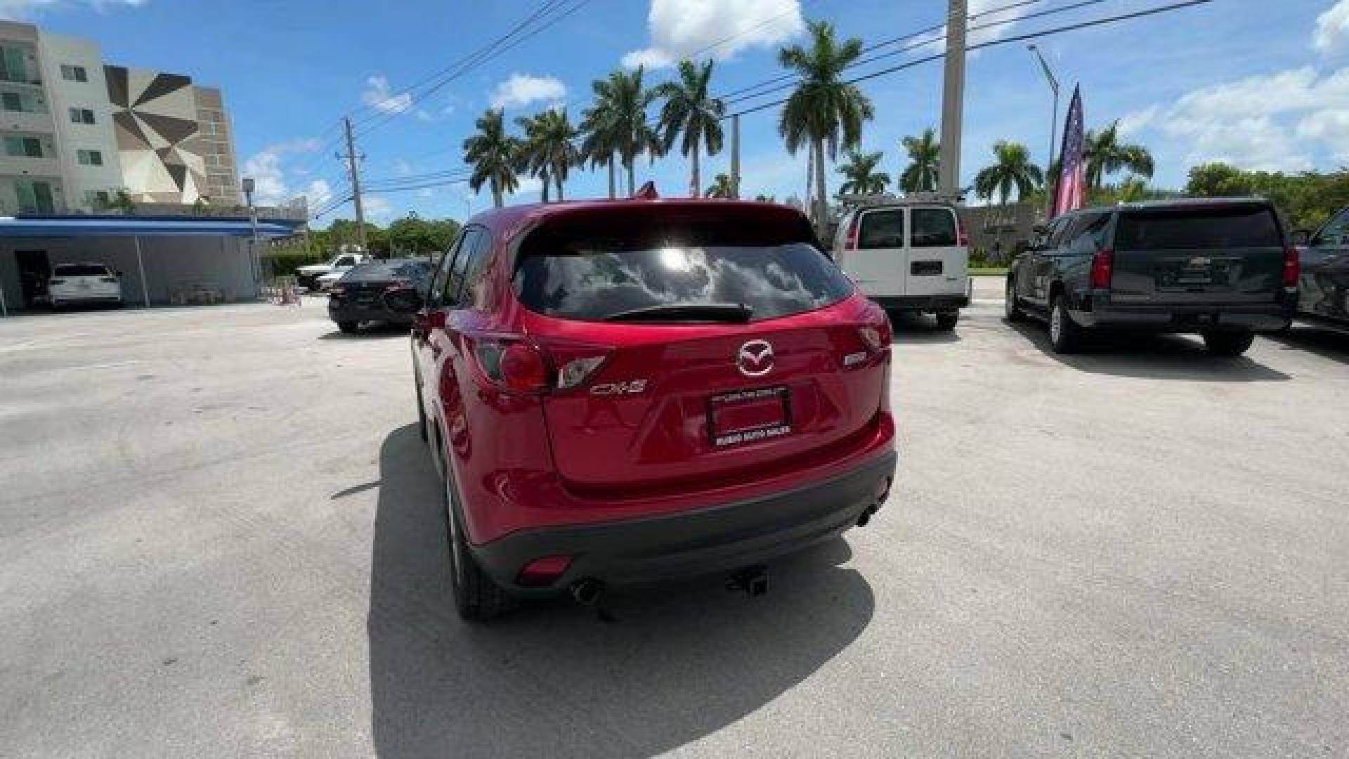 2016 Soul Red Metallic /Black Mazda CX-5 (JM3KE2CY4G0) with an 4 2.5 L engine, Automatic transmission, located at 27610 S Dixie Hwy, Homestead, FL, 33032, (305) 749-2348, 25.510241, -80.438301 - Only 10,120 Miles! Boasts 33 Highway MPG and 26 City MPG! This Mazda CX-5 delivers a Regular Unleaded I-4 2.5 L/152 engine powering this Automatic transmission. SOUL RED METALLIC PAINT, SOUL RED METALLIC, BLACK, CLOTH SEAT TRIM.*This Mazda CX-5 Comes Equipped with These Options *Wheels: 17 x 7J Alum - Photo#3