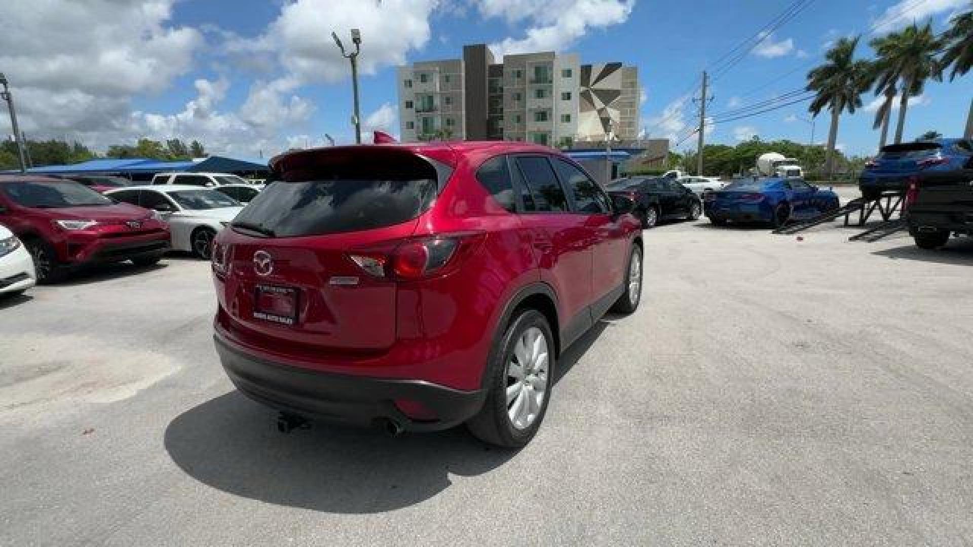 2016 Soul Red Metallic /Black Mazda CX-5 (JM3KE2CY4G0) with an 4 2.5 L engine, Automatic transmission, located at 27610 S Dixie Hwy, Homestead, FL, 33032, (305) 749-2348, 25.510241, -80.438301 - Only 10,120 Miles! Boasts 33 Highway MPG and 26 City MPG! This Mazda CX-5 delivers a Regular Unleaded I-4 2.5 L/152 engine powering this Automatic transmission. SOUL RED METALLIC PAINT, SOUL RED METALLIC, BLACK, CLOTH SEAT TRIM.*This Mazda CX-5 Comes Equipped with These Options *Wheels: 17 x 7J Alum - Photo#4