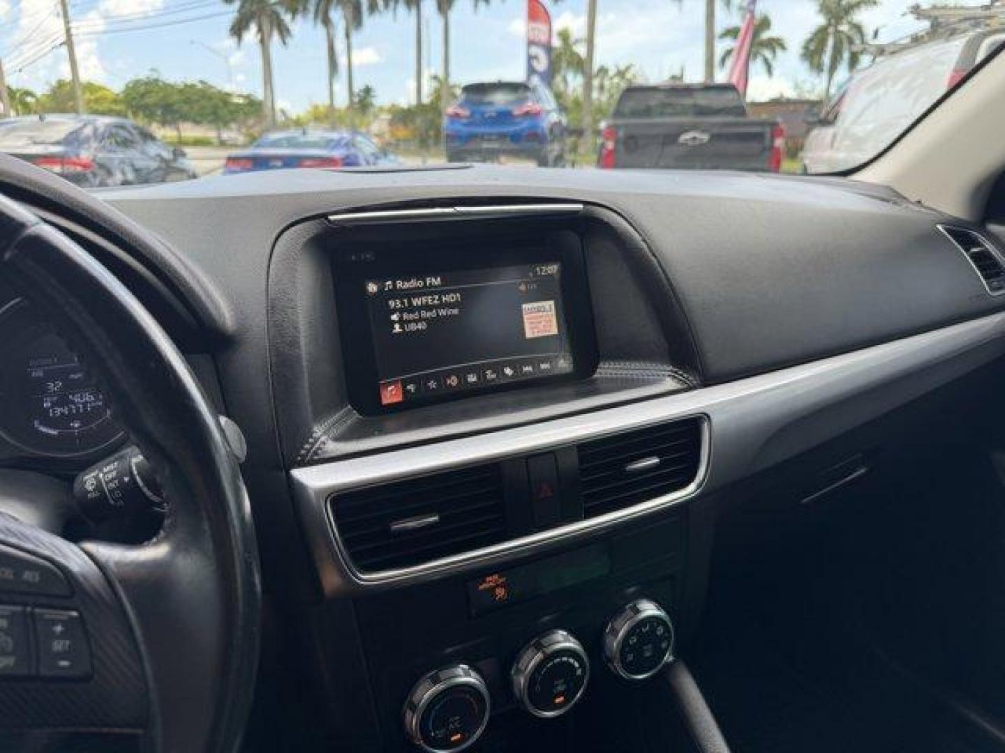 2016 Soul Red Metallic /Black Mazda CX-5 (JM3KE2CY4G0) with an 4 2.5 L engine, Automatic transmission, located at 27610 S Dixie Hwy, Homestead, FL, 33032, (305) 749-2348, 25.510241, -80.438301 - Only 10,120 Miles! Boasts 33 Highway MPG and 26 City MPG! This Mazda CX-5 delivers a Regular Unleaded I-4 2.5 L/152 engine powering this Automatic transmission. SOUL RED METALLIC PAINT, SOUL RED METALLIC, BLACK, CLOTH SEAT TRIM.*This Mazda CX-5 Comes Equipped with These Options *Wheels: 17 x 7J Alum - Photo#9
