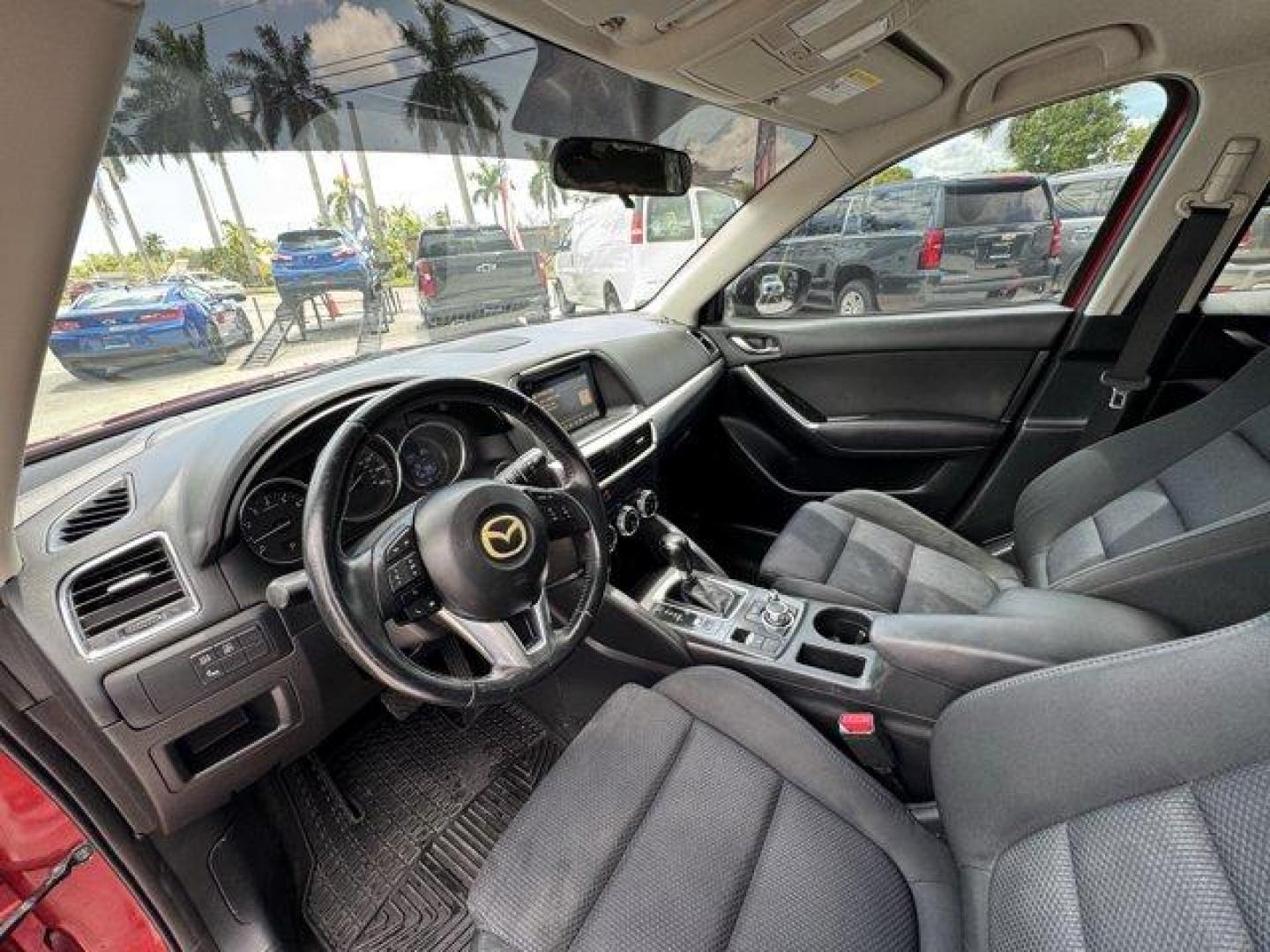 2016 Soul Red Metallic /Black Mazda CX-5 (JM3KE2CY4G0) with an 4 2.5 L engine, Automatic transmission, located at 27610 S Dixie Hwy, Homestead, FL, 33032, (305) 749-2348, 25.510241, -80.438301 - Only 10,120 Miles! Boasts 33 Highway MPG and 26 City MPG! This Mazda CX-5 delivers a Regular Unleaded I-4 2.5 L/152 engine powering this Automatic transmission. SOUL RED METALLIC PAINT, SOUL RED METALLIC, BLACK, CLOTH SEAT TRIM.*This Mazda CX-5 Comes Equipped with These Options *Wheels: 17 x 7J Alum - Photo#10