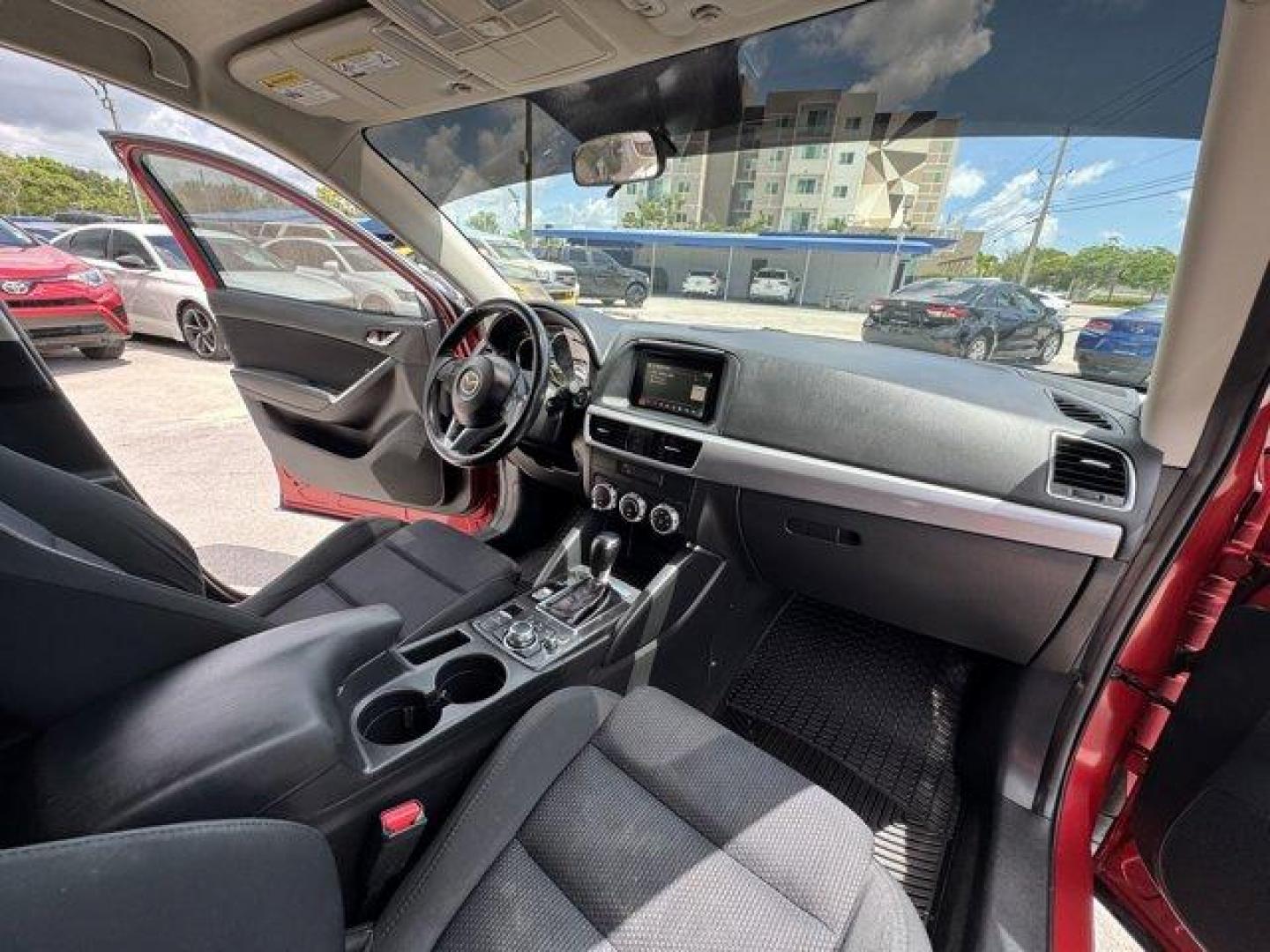2016 Soul Red Metallic /Black Mazda CX-5 (JM3KE2CY4G0) with an 4 2.5 L engine, Automatic transmission, located at 27610 S Dixie Hwy, Homestead, FL, 33032, (305) 749-2348, 25.510241, -80.438301 - Only 10,120 Miles! Boasts 33 Highway MPG and 26 City MPG! This Mazda CX-5 delivers a Regular Unleaded I-4 2.5 L/152 engine powering this Automatic transmission. SOUL RED METALLIC PAINT, SOUL RED METALLIC, BLACK, CLOTH SEAT TRIM.*This Mazda CX-5 Comes Equipped with These Options *Wheels: 17 x 7J Alum - Photo#11