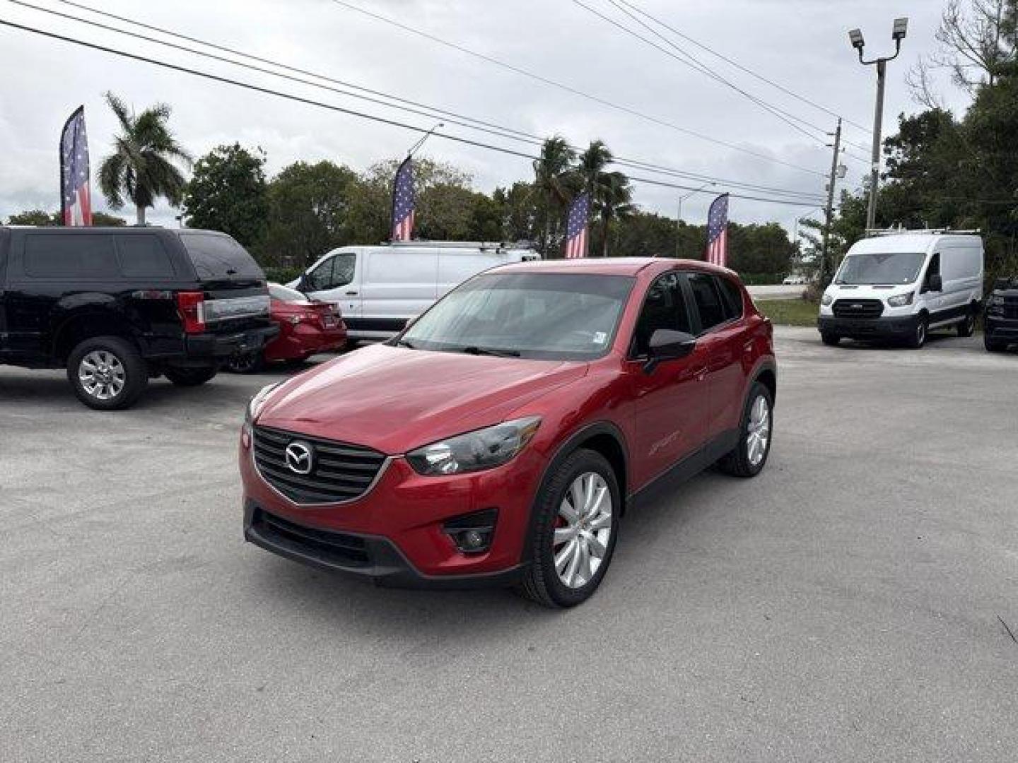 2016 Soul Red Metallic /Black Mazda CX-5 (JM3KE2CY4G0) with an 4 2.5 L engine, Automatic transmission, located at 27610 S Dixie Hwy, Homestead, FL, 33032, (305) 749-2348, 25.510241, -80.438301 - Only 10,120 Miles! Boasts 33 Highway MPG and 26 City MPG! This Mazda CX-5 delivers a Regular Unleaded I-4 2.5 L/152 engine powering this Automatic transmission. SOUL RED METALLIC PAINT, SOUL RED METALLIC, BLACK, CLOTH SEAT TRIM.*This Mazda CX-5 Comes Equipped with These Options *Wheels: 17 x 7J Alum - Photo#0