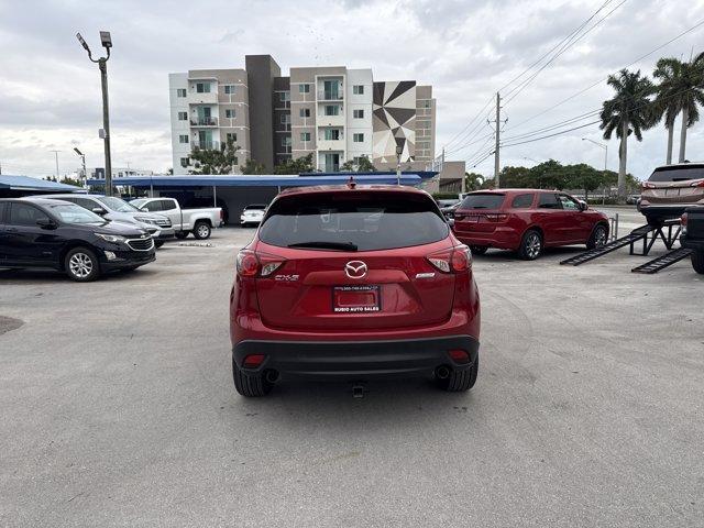 2016 Soul Red Metallic /Black Mazda CX-5 (JM3KE2CY4G0) with an 4 2.5 L engine, Automatic transmission, located at 27610 S Dixie Hwy, Homestead, FL, 33032, (305) 749-2348, 25.510241, -80.438301 - Only 10,120 Miles! Boasts 33 Highway MPG and 26 City MPG! This Mazda CX-5 delivers a Regular Unleaded I-4 2.5 L/152 engine powering this Automatic transmission. SOUL RED METALLIC PAINT, SOUL RED METALLIC, BLACK, CLOTH SEAT TRIM.*This Mazda CX-5 Comes Equipped with These Options *Wheels: 17 x 7J Alum - Photo#3