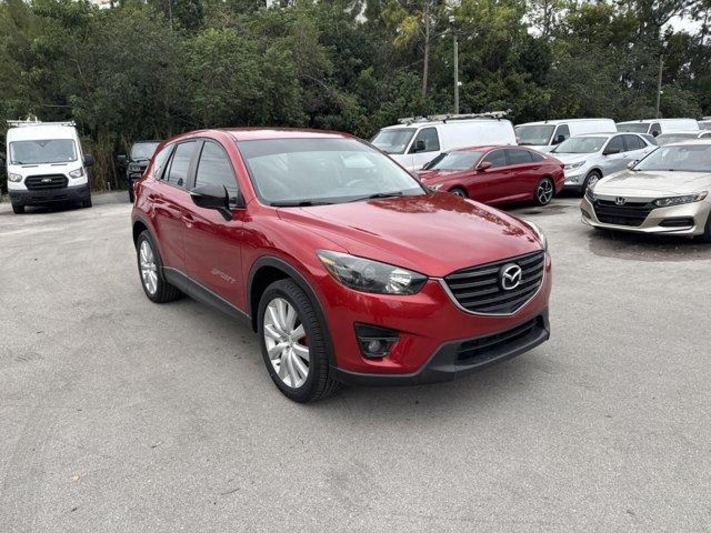 2016 Soul Red Metallic /Black Mazda CX-5 (JM3KE2CY4G0) with an 4 2.5 L engine, Automatic transmission, located at 27610 S Dixie Hwy, Homestead, FL, 33032, (305) 749-2348, 25.510241, -80.438301 - Only 10,120 Miles! Boasts 33 Highway MPG and 26 City MPG! This Mazda CX-5 delivers a Regular Unleaded I-4 2.5 L/152 engine powering this Automatic transmission. SOUL RED METALLIC PAINT, SOUL RED METALLIC, BLACK, CLOTH SEAT TRIM.*This Mazda CX-5 Comes Equipped with These Options *Wheels: 17 x 7J Alum - Photo#6
