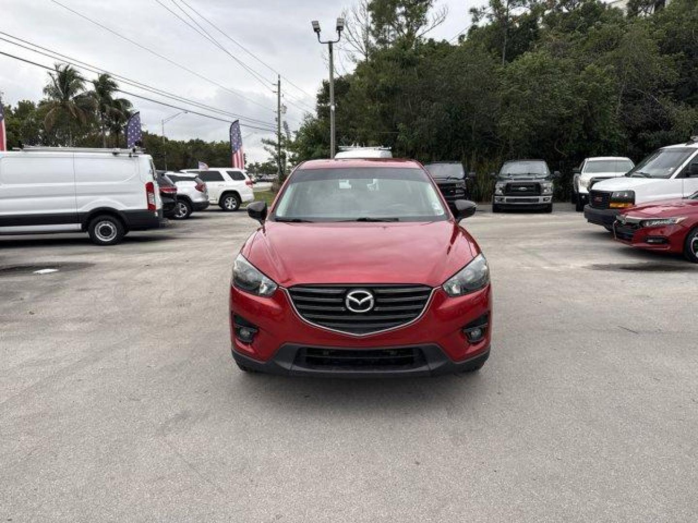 2016 Soul Red Metallic /Black Mazda CX-5 (JM3KE2CY4G0) with an 4 2.5 L engine, Automatic transmission, located at 27610 S Dixie Hwy, Homestead, FL, 33032, (305) 749-2348, 25.510241, -80.438301 - Only 10,120 Miles! Boasts 33 Highway MPG and 26 City MPG! This Mazda CX-5 delivers a Regular Unleaded I-4 2.5 L/152 engine powering this Automatic transmission. SOUL RED METALLIC PAINT, SOUL RED METALLIC, BLACK, CLOTH SEAT TRIM.*This Mazda CX-5 Comes Equipped with These Options *Wheels: 17 x 7J Alum - Photo#7