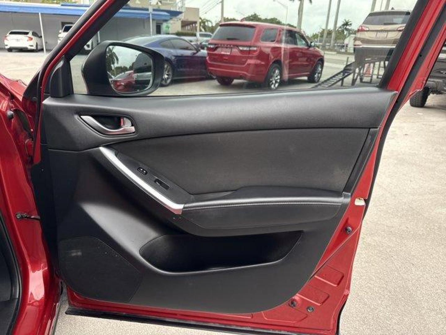 2016 Soul Red Metallic /Black Mazda CX-5 (JM3KE2CY4G0) with an 4 2.5 L engine, Automatic transmission, located at 27610 S Dixie Hwy, Homestead, FL, 33032, (305) 749-2348, 25.510241, -80.438301 - Only 10,120 Miles! Boasts 33 Highway MPG and 26 City MPG! This Mazda CX-5 delivers a Regular Unleaded I-4 2.5 L/152 engine powering this Automatic transmission. SOUL RED METALLIC PAINT, SOUL RED METALLIC, BLACK, CLOTH SEAT TRIM.*This Mazda CX-5 Comes Equipped with These Options *Wheels: 17 x 7J Alum - Photo#17