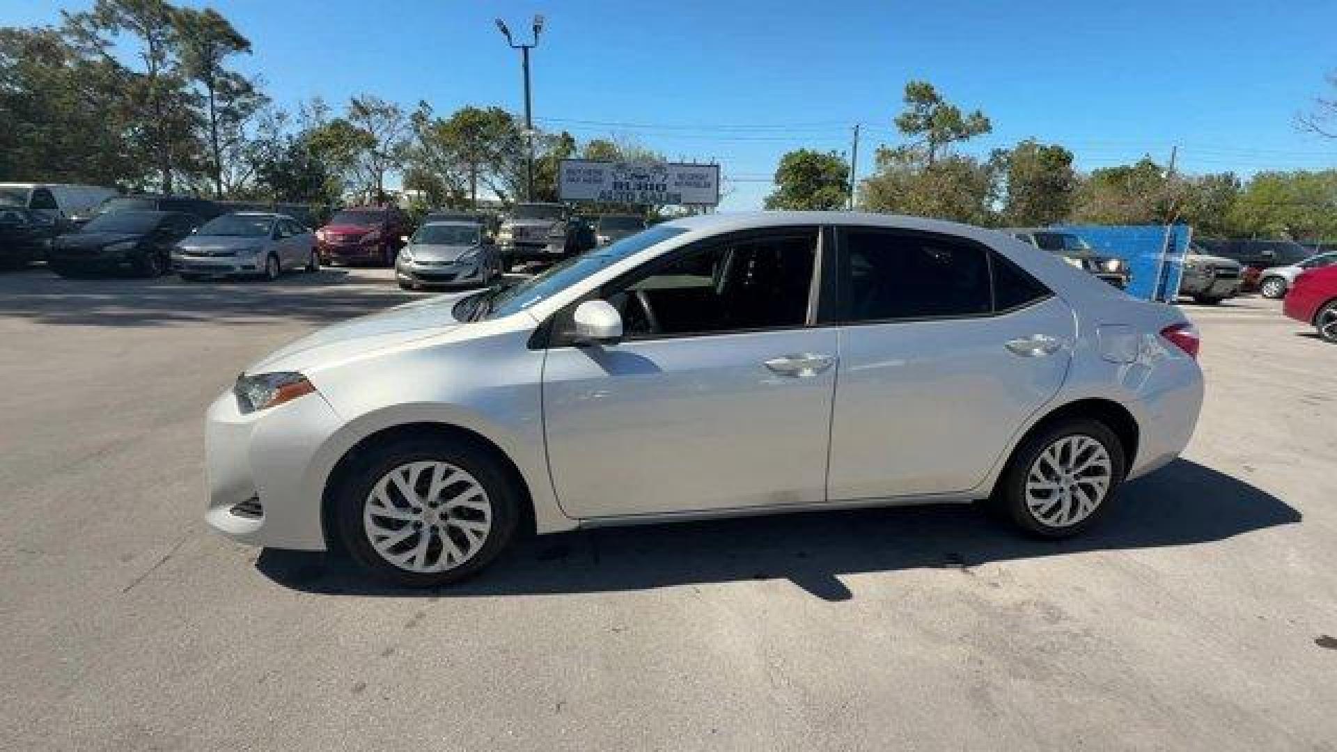 2017 Silver Toyota Corolla (5YFBURHE1HP) with an 4 1.8 L engine, Variable transmission, located at 27610 S Dixie Hwy, Homestead, FL, 33032, (305) 749-2348, 25.510241, -80.438301 - KBB.com 10 Best Used Cars Under $15,000. This Toyota Corolla boasts a Regular Unleaded I-4 1.8 L/110 engine powering this Variable transmission. Urethane Gear Shifter Material, Trunk Rear Cargo Access, Trip Computer.* This Toyota Corolla Features the Following Options *Transmission: Continuously Var - Photo#1