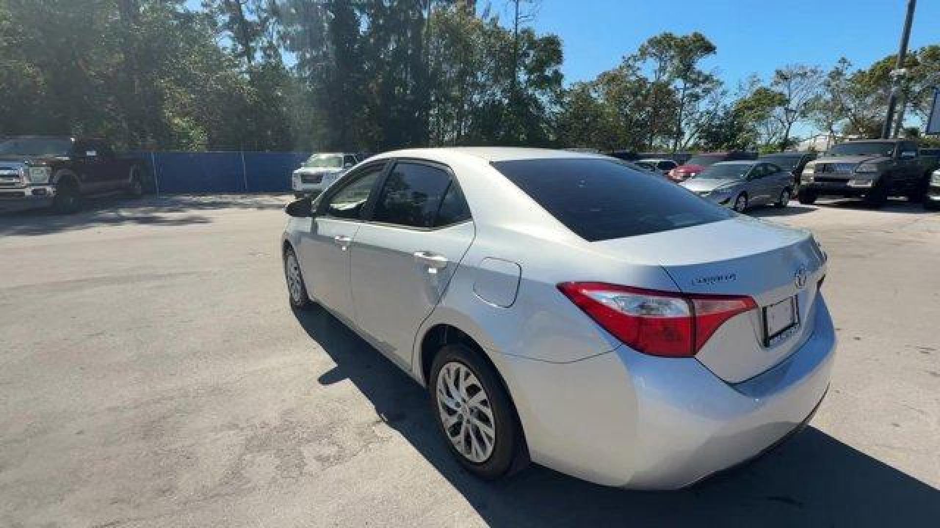 2017 Silver Toyota Corolla (5YFBURHE1HP) with an 4 1.8 L engine, Variable transmission, located at 27610 S Dixie Hwy, Homestead, FL, 33032, (305) 749-2348, 25.510241, -80.438301 - KBB.com 10 Best Used Cars Under $15,000. This Toyota Corolla boasts a Regular Unleaded I-4 1.8 L/110 engine powering this Variable transmission. Urethane Gear Shifter Material, Trunk Rear Cargo Access, Trip Computer.* This Toyota Corolla Features the Following Options *Transmission: Continuously Var - Photo#2