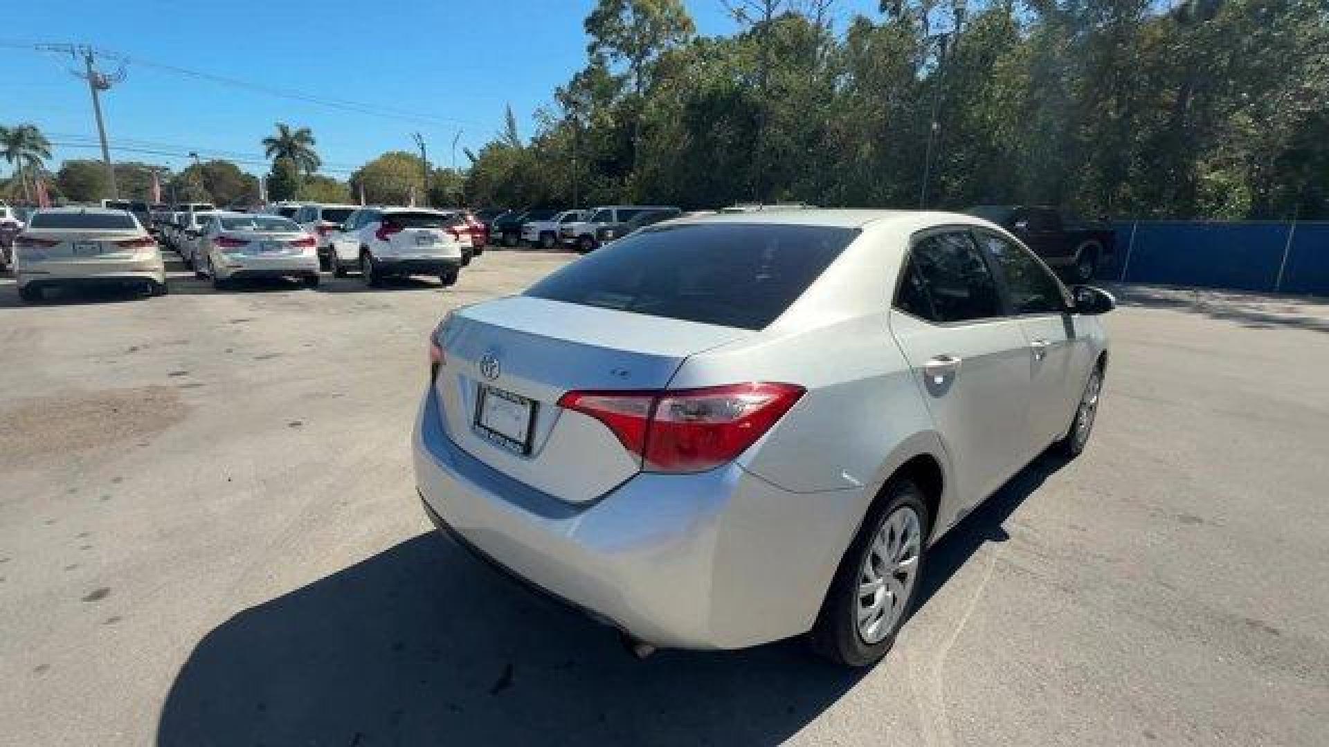 2017 Silver Toyota Corolla (5YFBURHE1HP) with an 4 1.8 L engine, Variable transmission, located at 27610 S Dixie Hwy, Homestead, FL, 33032, (305) 749-2348, 25.510241, -80.438301 - KBB.com 10 Best Used Cars Under $15,000. This Toyota Corolla boasts a Regular Unleaded I-4 1.8 L/110 engine powering this Variable transmission. Urethane Gear Shifter Material, Trunk Rear Cargo Access, Trip Computer.* This Toyota Corolla Features the Following Options *Transmission: Continuously Var - Photo#4