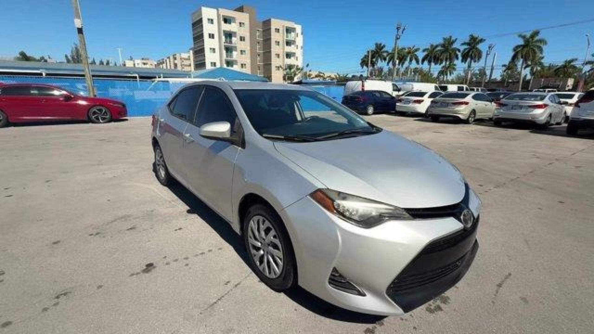 2017 Silver Toyota Corolla (5YFBURHE1HP) with an 4 1.8 L engine, Variable transmission, located at 27610 S Dixie Hwy, Homestead, FL, 33032, (305) 749-2348, 25.510241, -80.438301 - KBB.com 10 Best Used Cars Under $15,000. This Toyota Corolla boasts a Regular Unleaded I-4 1.8 L/110 engine powering this Variable transmission. Urethane Gear Shifter Material, Trunk Rear Cargo Access, Trip Computer.* This Toyota Corolla Features the Following Options *Transmission: Continuously Var - Photo#6