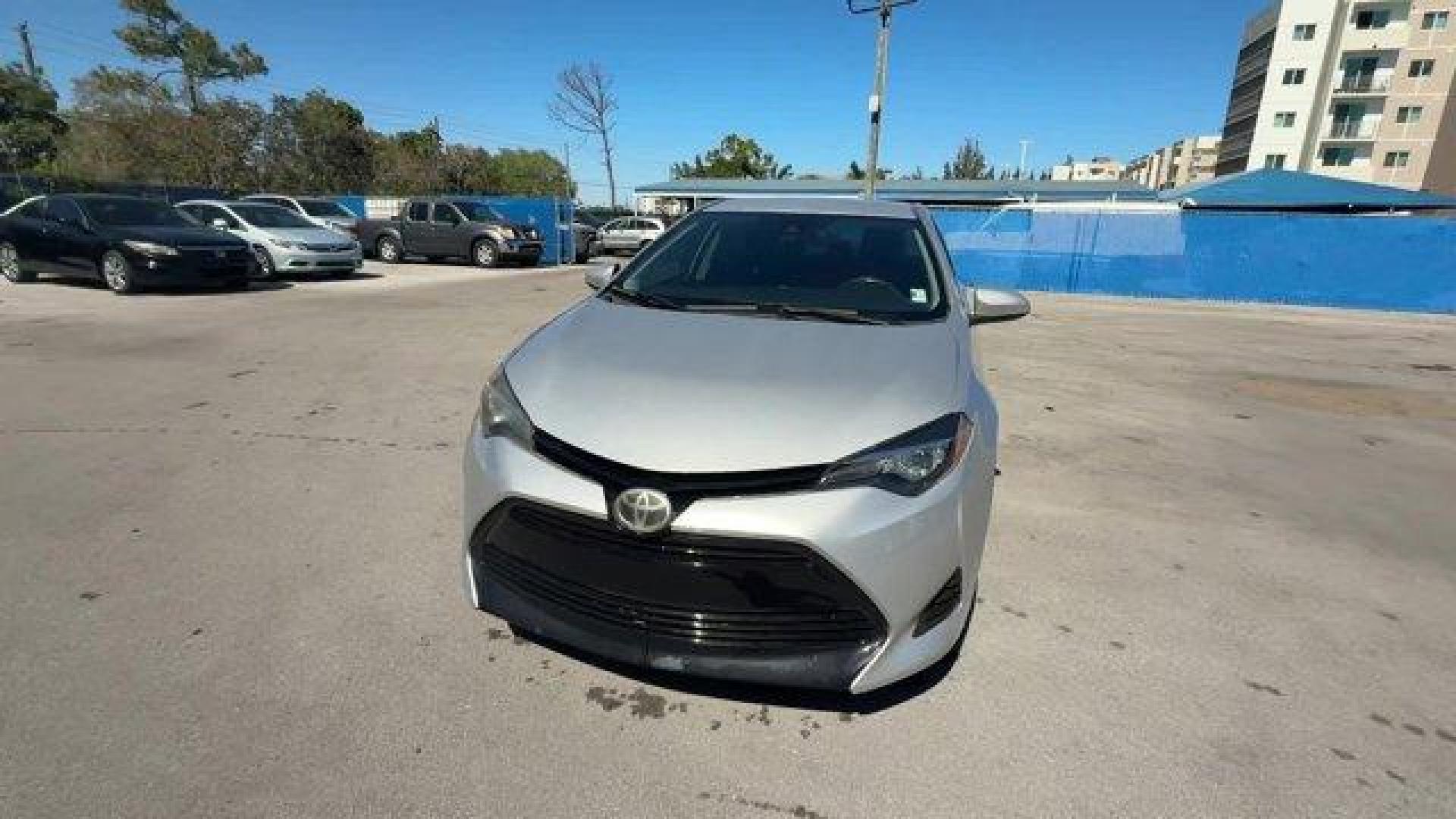 2017 Silver Toyota Corolla (5YFBURHE1HP) with an 4 1.8 L engine, Variable transmission, located at 27610 S Dixie Hwy, Homestead, FL, 33032, (305) 749-2348, 25.510241, -80.438301 - KBB.com 10 Best Used Cars Under $15,000. This Toyota Corolla boasts a Regular Unleaded I-4 1.8 L/110 engine powering this Variable transmission. Urethane Gear Shifter Material, Trunk Rear Cargo Access, Trip Computer.* This Toyota Corolla Features the Following Options *Transmission: Continuously Var - Photo#7