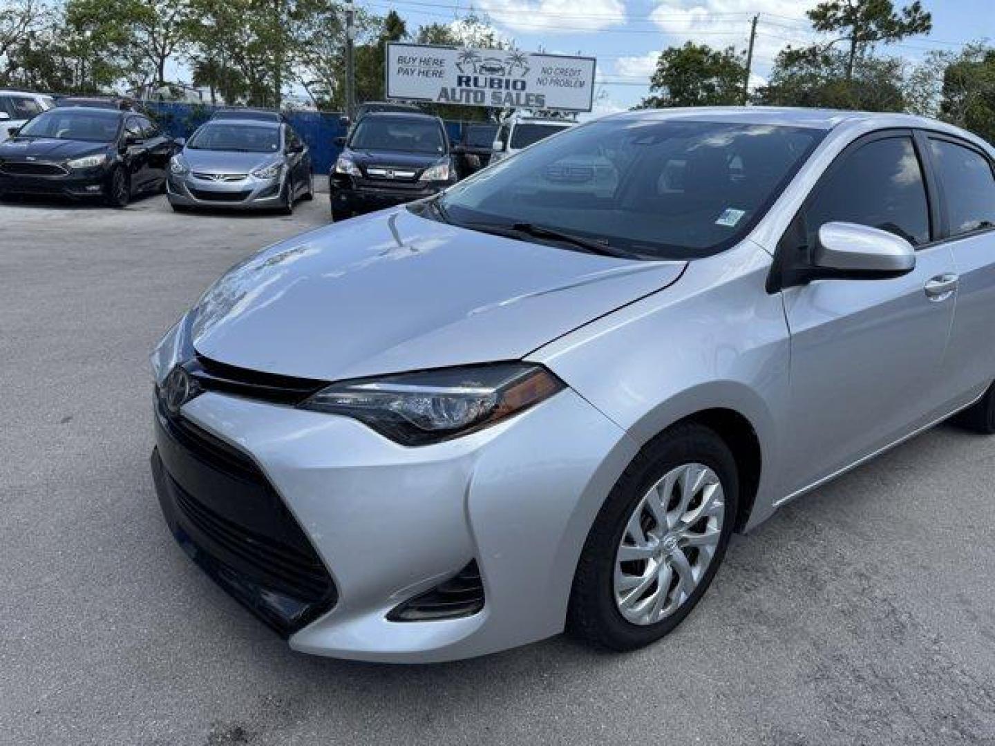 2017 Silver Toyota Corolla (5YFBURHE1HP) with an 4 1.8 L engine, Variable transmission, located at 27610 S Dixie Hwy, Homestead, FL, 33032, (305) 749-2348, 25.510241, -80.438301 - KBB.com 10 Best Used Cars Under $15,000. This Toyota Corolla boasts a Regular Unleaded I-4 1.8 L/110 engine powering this Variable transmission. Urethane Gear Shifter Material, Trunk Rear Cargo Access, Trip Computer.* This Toyota Corolla Features the Following Options *Transmission: Continuously Var - Photo#1