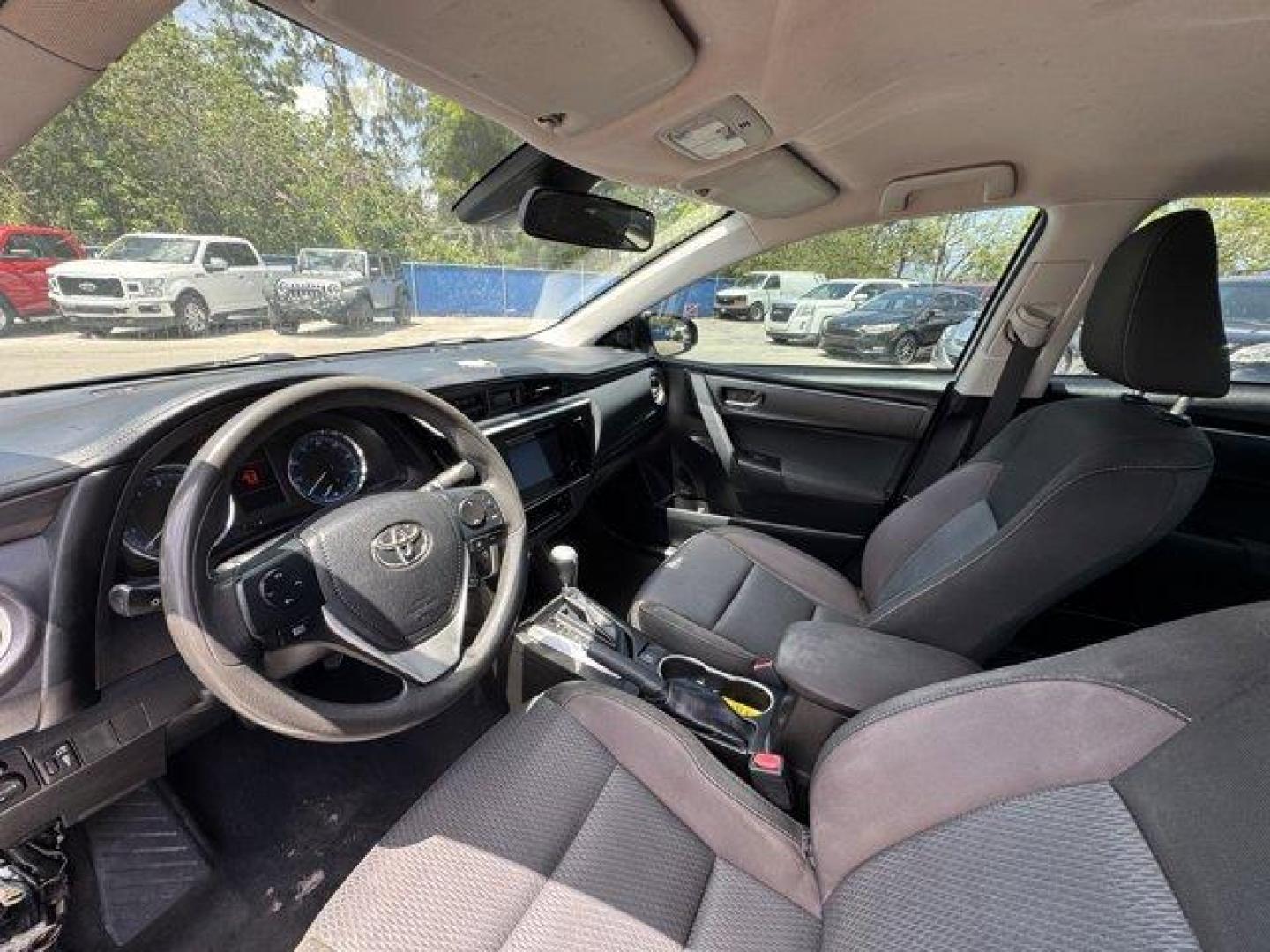 2017 Silver Toyota Corolla (5YFBURHE1HP) with an 4 1.8 L engine, Variable transmission, located at 27610 S Dixie Hwy, Homestead, FL, 33032, (305) 749-2348, 25.510241, -80.438301 - KBB.com 10 Best Used Cars Under $15,000. This Toyota Corolla boasts a Regular Unleaded I-4 1.8 L/110 engine powering this Variable transmission. Urethane Gear Shifter Material, Trunk Rear Cargo Access, Trip Computer.* This Toyota Corolla Features the Following Options *Transmission: Continuously Var - Photo#4