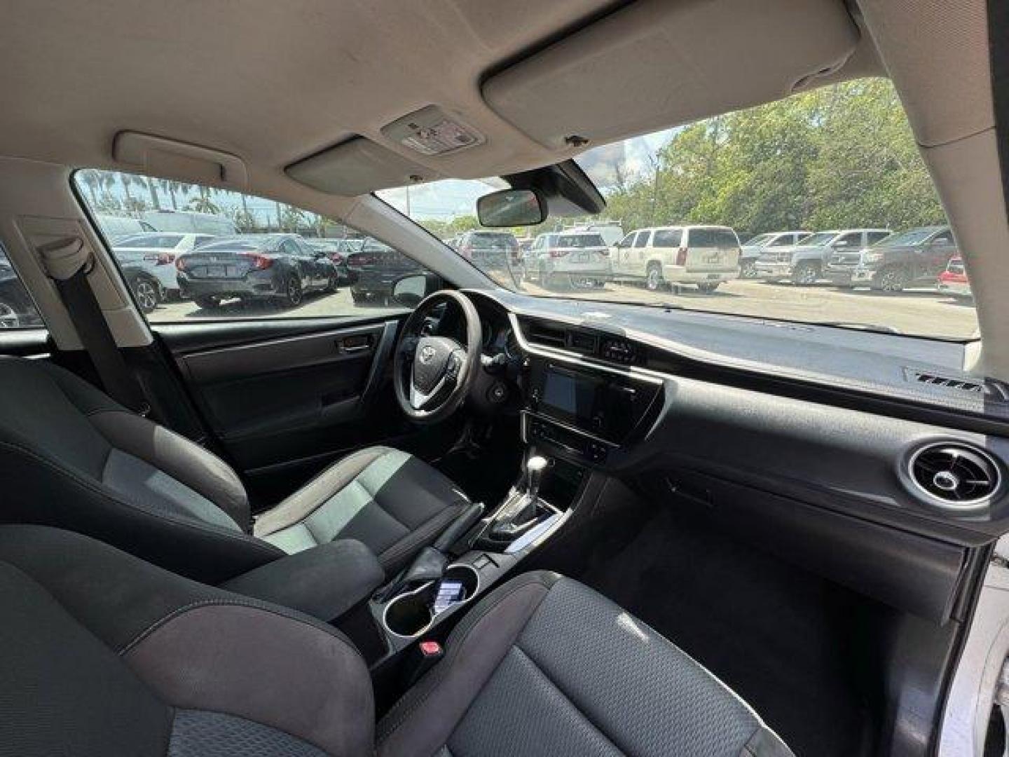 2017 Silver Toyota Corolla (5YFBURHE1HP) with an 4 1.8 L engine, Variable transmission, located at 27610 S Dixie Hwy, Homestead, FL, 33032, (305) 749-2348, 25.510241, -80.438301 - KBB.com 10 Best Used Cars Under $15,000. This Toyota Corolla boasts a Regular Unleaded I-4 1.8 L/110 engine powering this Variable transmission. Urethane Gear Shifter Material, Trunk Rear Cargo Access, Trip Computer.* This Toyota Corolla Features the Following Options *Transmission: Continuously Var - Photo#5