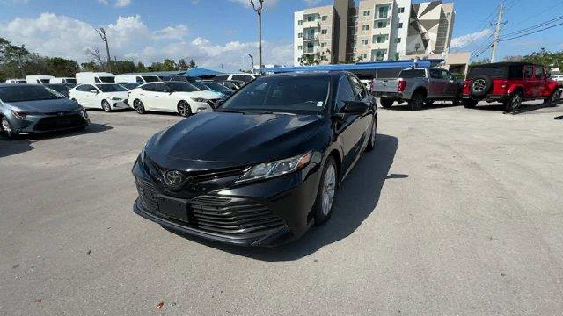2019 Black Toyota Camry (4T1B11HK0KU) with an 4 2.5 L engine, Automatic transmission, located at 27610 S Dixie Hwy, Homestead, FL, 33032, (305) 749-2348, 25.510241, -80.438301 - KBB.com 10 Most Comfortable Cars Under $30,000. This Toyota Camry boasts a Regular Unleaded I-4 2.5 L/152 engine powering this Automatic transmission. Window Grid And Roof Mount Antenna, Variable Intermittent Wipers, Valet Function.*This Toyota Camry Comes Equipped with These Options *Trunk Rear Car - Photo#0