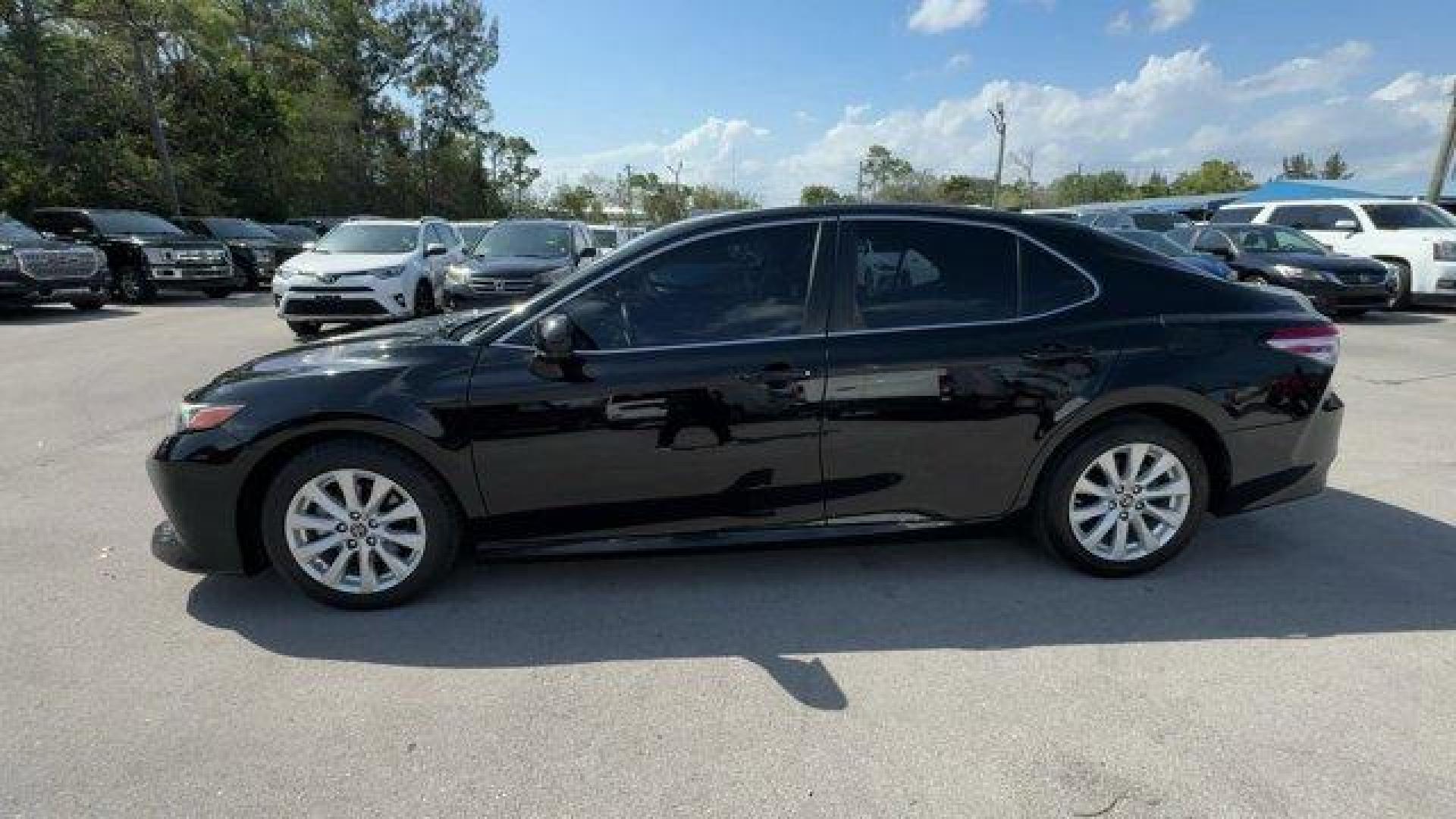 2019 Black Toyota Camry (4T1B11HK0KU) with an 4 2.5 L engine, Automatic transmission, located at 27610 S Dixie Hwy, Homestead, FL, 33032, (305) 749-2348, 25.510241, -80.438301 - KBB.com 10 Most Comfortable Cars Under $30,000. This Toyota Camry boasts a Regular Unleaded I-4 2.5 L/152 engine powering this Automatic transmission. Window Grid And Roof Mount Antenna, Variable Intermittent Wipers, Valet Function.*This Toyota Camry Comes Equipped with These Options *Trunk Rear Car - Photo#1