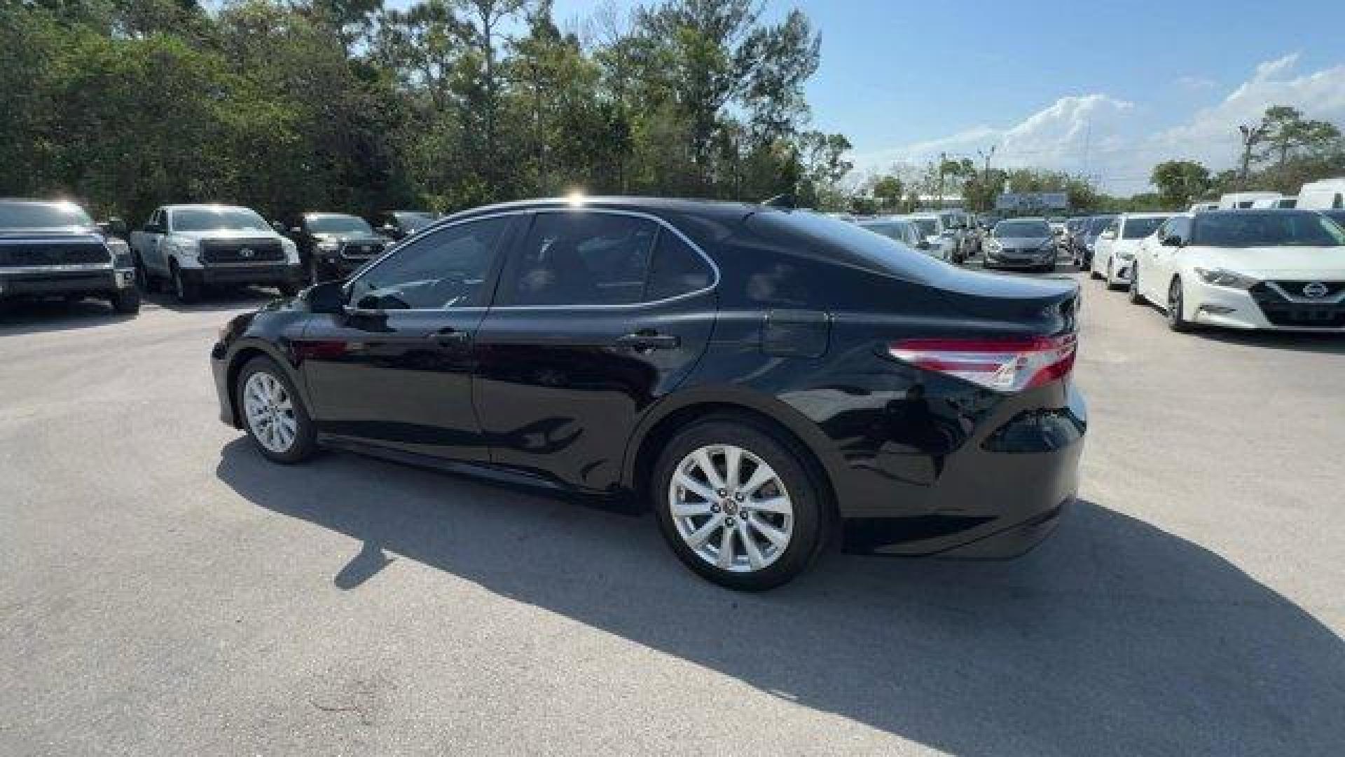 2019 Black Toyota Camry (4T1B11HK0KU) with an 4 2.5 L engine, Automatic transmission, located at 27610 S Dixie Hwy, Homestead, FL, 33032, (305) 749-2348, 25.510241, -80.438301 - KBB.com 10 Most Comfortable Cars Under $30,000. This Toyota Camry boasts a Regular Unleaded I-4 2.5 L/152 engine powering this Automatic transmission. Window Grid And Roof Mount Antenna, Variable Intermittent Wipers, Valet Function.*This Toyota Camry Comes Equipped with These Options *Trunk Rear Car - Photo#2