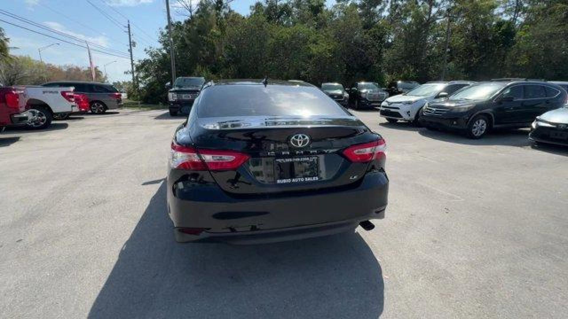 2019 Black Toyota Camry (4T1B11HK0KU) with an 4 2.5 L engine, Automatic transmission, located at 27610 S Dixie Hwy, Homestead, FL, 33032, (305) 749-2348, 25.510241, -80.438301 - KBB.com 10 Most Comfortable Cars Under $30,000. This Toyota Camry boasts a Regular Unleaded I-4 2.5 L/152 engine powering this Automatic transmission. Window Grid And Roof Mount Antenna, Variable Intermittent Wipers, Valet Function.*This Toyota Camry Comes Equipped with These Options *Trunk Rear Car - Photo#3