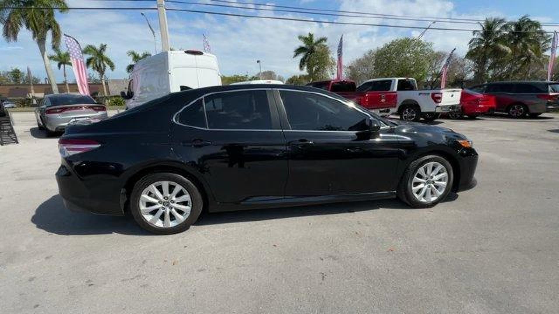 2019 Black Toyota Camry (4T1B11HK0KU) with an 4 2.5 L engine, Automatic transmission, located at 27610 S Dixie Hwy, Homestead, FL, 33032, (305) 749-2348, 25.510241, -80.438301 - KBB.com 10 Most Comfortable Cars Under $30,000. This Toyota Camry boasts a Regular Unleaded I-4 2.5 L/152 engine powering this Automatic transmission. Window Grid And Roof Mount Antenna, Variable Intermittent Wipers, Valet Function.*This Toyota Camry Comes Equipped with These Options *Trunk Rear Car - Photo#5