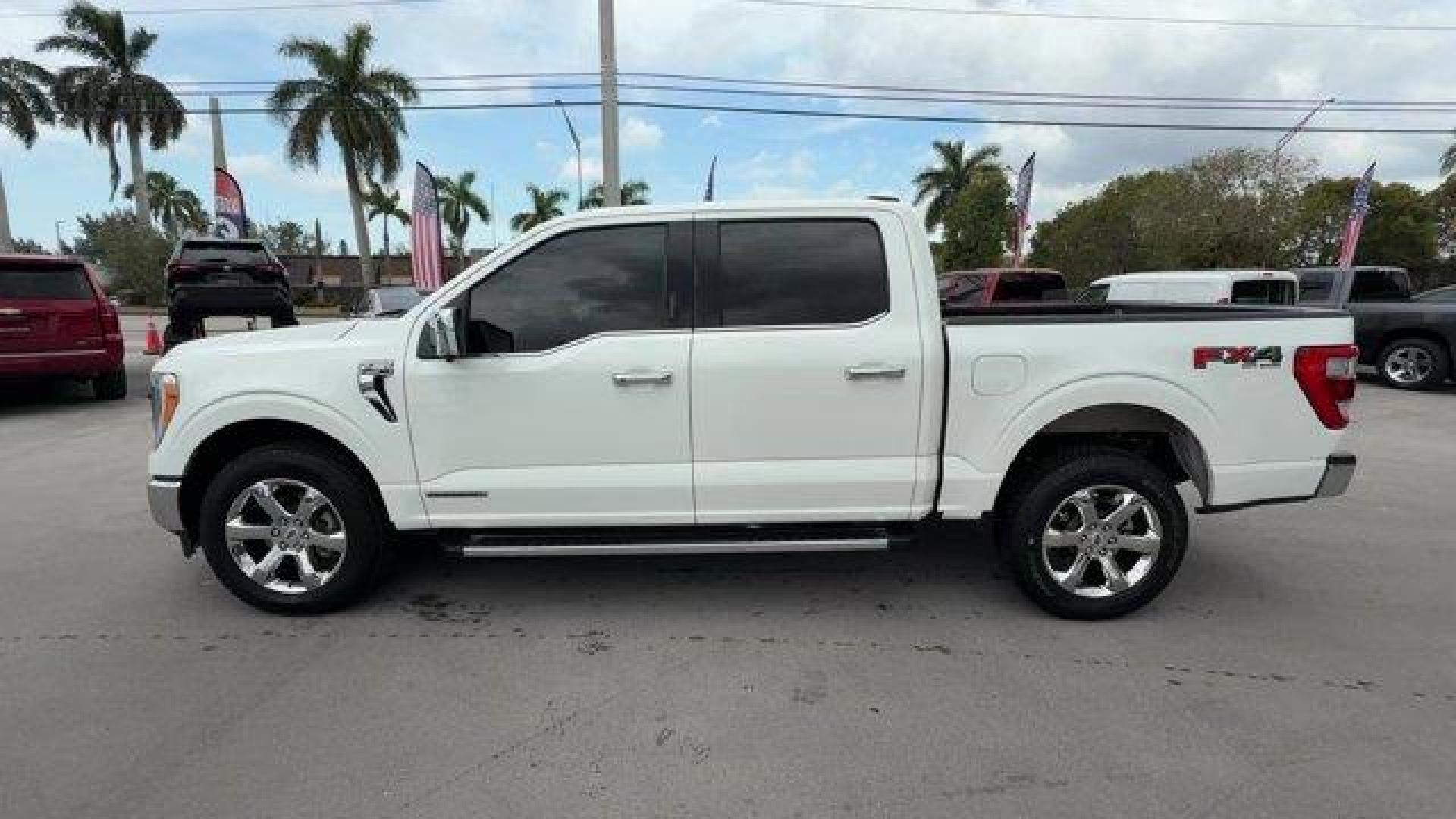 2021 White Ford F-150 (1FTFW1EDXMF) with an 6 3.5 L engine, Automatic transmission, located at 27610 S Dixie Hwy, Homestead, FL, 33032, (305) 749-2348, 25.510241, -80.438301 - NACTOY 2021 North American Truck of the Year. Only 35,207 Miles! This Ford F-150 delivers a PowerBoost Full-Hybrid V6 3.5 L engine powering this Automatic transmission. ENGINE: 3.5L POWERBOOST FULL-HYBRID V6 -inc: Electronic Locking w/3.73 Axle Ratio, GVWR: 7,350 lbs Payload Package, Dual Zone Autom - Photo#1