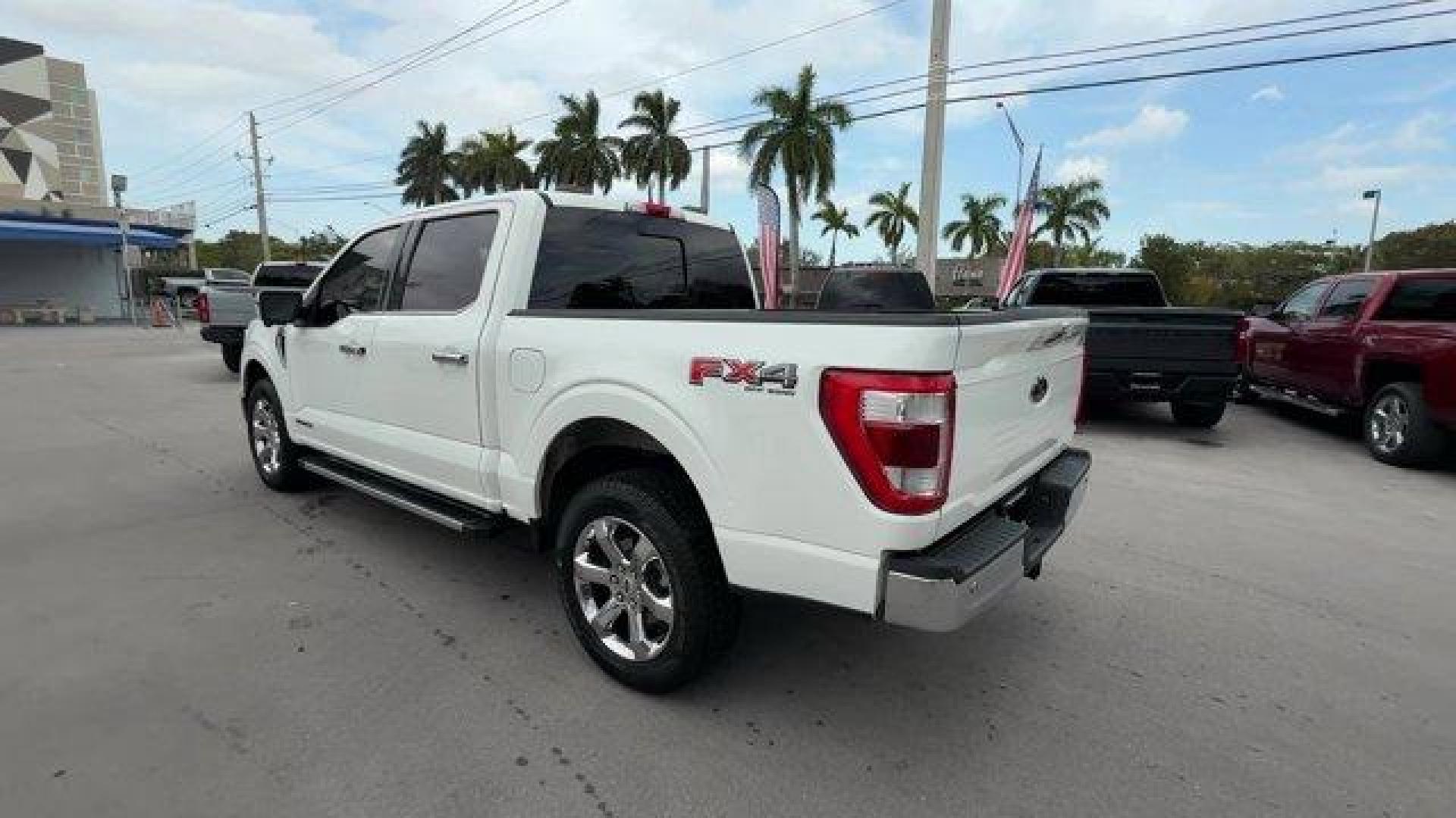2021 White Ford F-150 (1FTFW1EDXMF) with an 6 3.5 L engine, Automatic transmission, located at 27610 S Dixie Hwy, Homestead, FL, 33032, (305) 749-2348, 25.510241, -80.438301 - NACTOY 2021 North American Truck of the Year. Only 35,207 Miles! This Ford F-150 delivers a PowerBoost Full-Hybrid V6 3.5 L engine powering this Automatic transmission. ENGINE: 3.5L POWERBOOST FULL-HYBRID V6 -inc: Electronic Locking w/3.73 Axle Ratio, GVWR: 7,350 lbs Payload Package, Dual Zone Autom - Photo#2