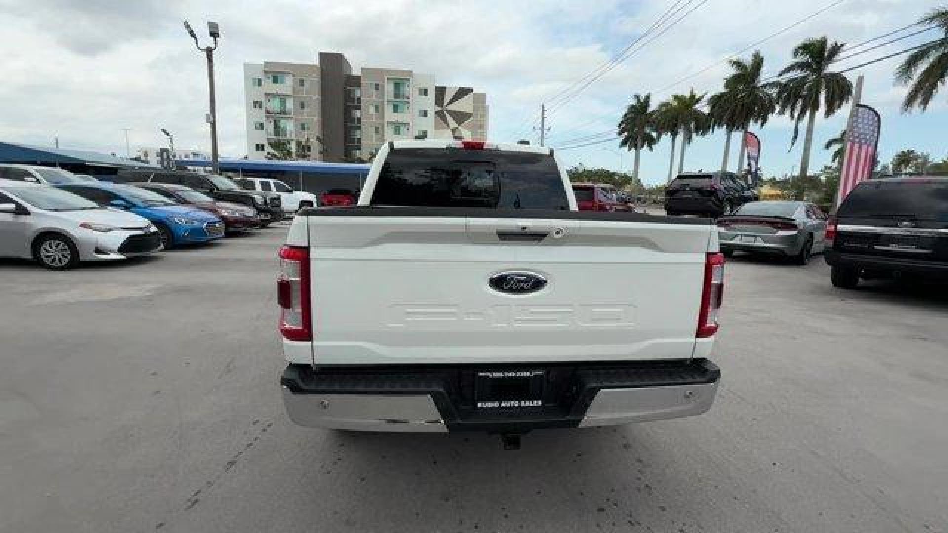 2021 White Ford F-150 (1FTFW1EDXMF) with an 6 3.5 L engine, Automatic transmission, located at 27610 S Dixie Hwy, Homestead, FL, 33032, (305) 749-2348, 25.510241, -80.438301 - NACTOY 2021 North American Truck of the Year. Only 35,207 Miles! This Ford F-150 delivers a PowerBoost Full-Hybrid V6 3.5 L engine powering this Automatic transmission. ENGINE: 3.5L POWERBOOST FULL-HYBRID V6 -inc: Electronic Locking w/3.73 Axle Ratio, GVWR: 7,350 lbs Payload Package, Dual Zone Autom - Photo#3