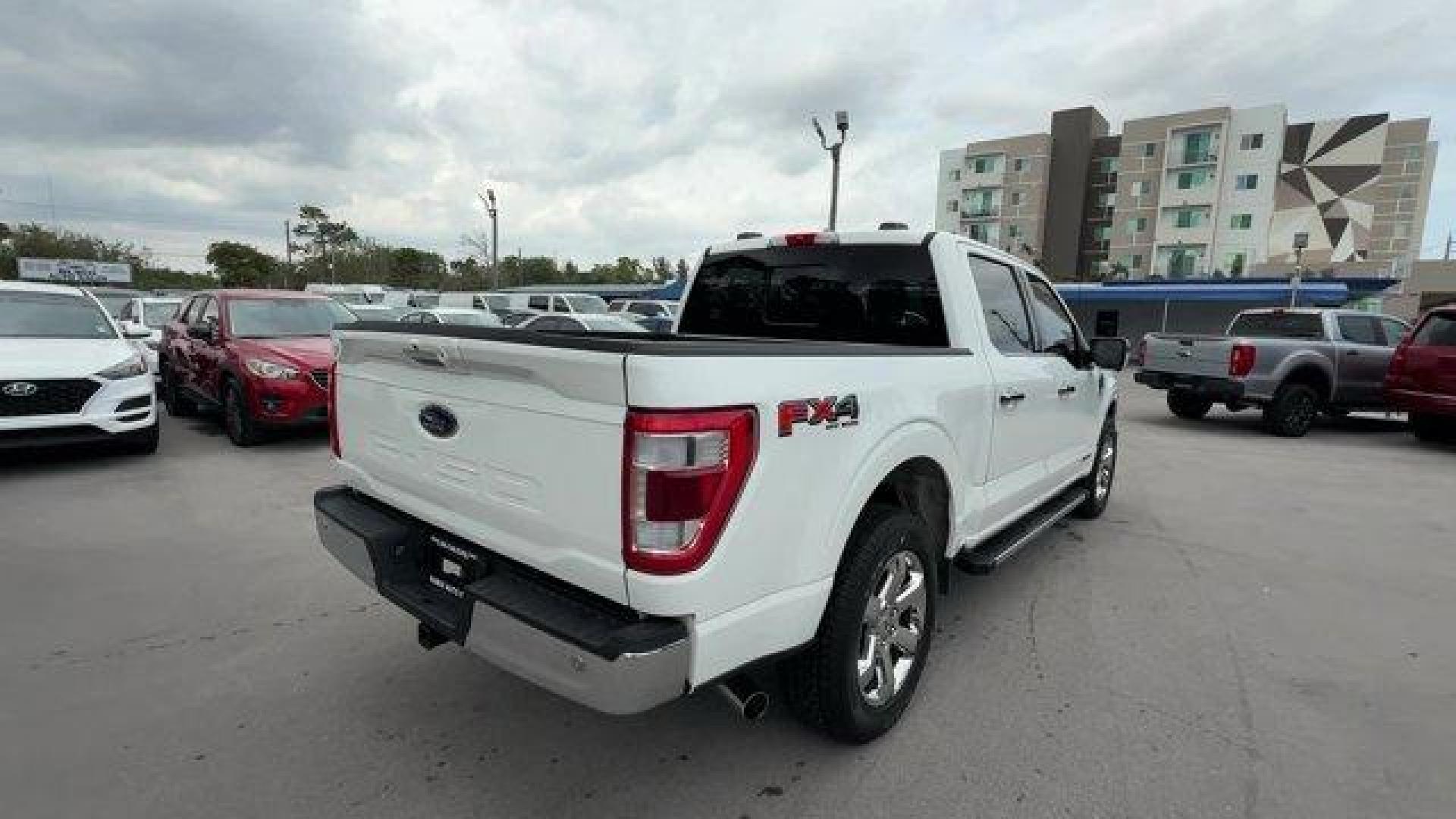 2021 White Ford F-150 (1FTFW1EDXMF) with an 6 3.5 L engine, Automatic transmission, located at 27610 S Dixie Hwy, Homestead, FL, 33032, (305) 749-2348, 25.510241, -80.438301 - NACTOY 2021 North American Truck of the Year. Only 35,207 Miles! This Ford F-150 delivers a PowerBoost Full-Hybrid V6 3.5 L engine powering this Automatic transmission. ENGINE: 3.5L POWERBOOST FULL-HYBRID V6 -inc: Electronic Locking w/3.73 Axle Ratio, GVWR: 7,350 lbs Payload Package, Dual Zone Autom - Photo#4