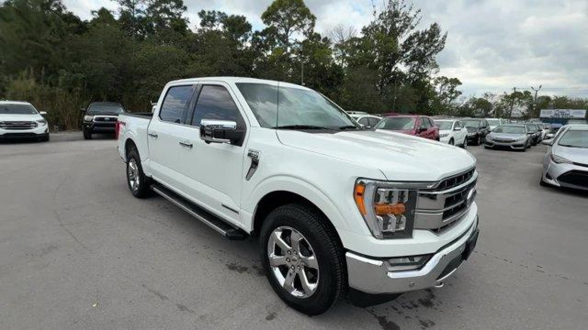 2021 White Ford F-150 (1FTFW1EDXMF) with an 6 3.5 L engine, Automatic transmission, located at 27610 S Dixie Hwy, Homestead, FL, 33032, (305) 749-2348, 25.510241, -80.438301 - NACTOY 2021 North American Truck of the Year. Only 35,207 Miles! This Ford F-150 delivers a PowerBoost Full-Hybrid V6 3.5 L engine powering this Automatic transmission. ENGINE: 3.5L POWERBOOST FULL-HYBRID V6 -inc: Electronic Locking w/3.73 Axle Ratio, GVWR: 7,350 lbs Payload Package, Dual Zone Autom - Photo#6