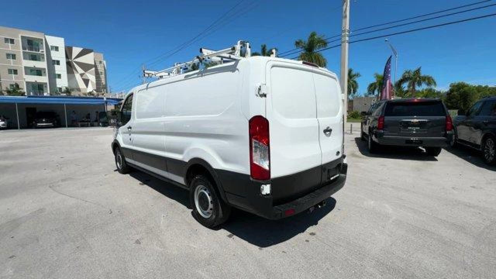 2021 White Ford Transit Cargo Van (1FTBR1Y8XMK) with an 6 3.5 L engine, Automatic transmission, located at 27610 S Dixie Hwy, Homestead, FL, 33032, (305) 749-2348, 25.510241, -80.438301 - This Ford Transit Cargo Van delivers a Regular Unleaded V-6 3.5 L/213 engine powering this Automatic transmission. ENGINE: 3.5L PFDI V6 FLEX-FUEL -inc: port injection, Auto Start-Stop Switch Delete, Deletes button on dash which disables auto start-stop technology, Deletes auto stop-start technology - Photo#2