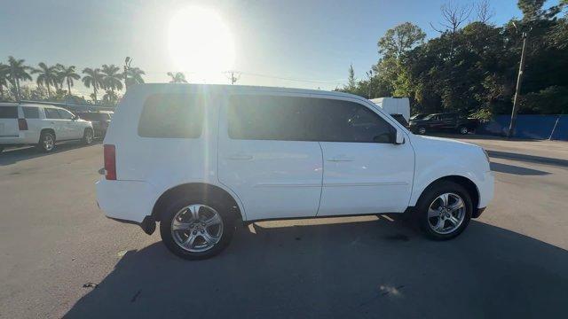 2014 White Honda Pilot (5FNYF3H57EB) with an 6 3.5 L engine, Automatic transmission, located at 27610 S Dixie Hwy, Homestead, FL, 33032, (305) 749-2348, 25.510241, -80.438301 - KBB.com 12 Best Family Cars. Boasts 25 Highway MPG and 18 City MPG! This Honda Pilot boasts a Regular Unleaded V-6 3.5 L/212 engine powering this Automatic transmission. XM Radio -inc: SiriusXM services require a subscription after any trial period, If you decide to continue your SiriusXM service at - Photo#5
