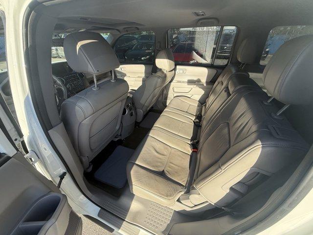 2014 White Honda Pilot (5FNYF3H57EB) with an 6 3.5 L engine, Automatic transmission, located at 27610 S Dixie Hwy, Homestead, FL, 33032, (305) 749-2348, 25.510241, -80.438301 - KBB.com 12 Best Family Cars. Boasts 25 Highway MPG and 18 City MPG! This Honda Pilot boasts a Regular Unleaded V-6 3.5 L/212 engine powering this Automatic transmission. XM Radio -inc: SiriusXM services require a subscription after any trial period, If you decide to continue your SiriusXM service at - Photo#12