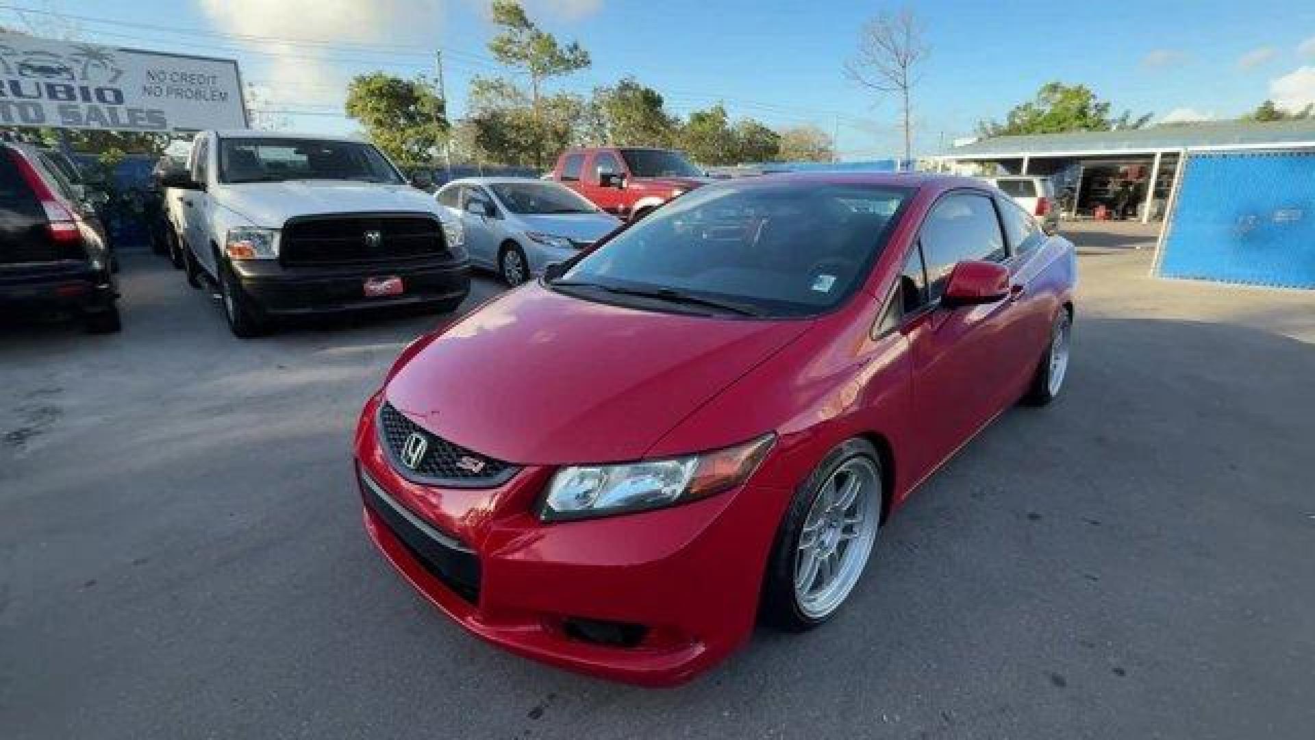 2012 Red Honda Civic Cpe (2HGFG4A50CH) with an 4 2.4L engine, Manual transmission, located at 27610 S Dixie Hwy, Homestead, FL, 33032, (305) 749-2348, 25.510241, -80.438301 - KBB.com Brand Image Awards. Only 105,663 Miles! Scores 31 Highway MPG and 22 City MPG! This Honda Civic Cpe delivers a Gas I4 2.4L/144 engine powering this Manual transmission. Vehicle Stability Assist (VSA) w/traction control, Variable intermittent windshield wipers, USB audio interface.*This Honda - Photo#0