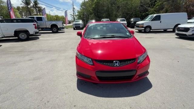 2012 Red Honda Civic Cpe (2HGFG4A50CH) with an 4 2.4L engine, Manual transmission, located at 27610 S Dixie Hwy, Homestead, FL, 33032, (305) 749-2348, 25.510241, -80.438301 - KBB.com Brand Image Awards. Only 105,663 Miles! Scores 31 Highway MPG and 22 City MPG! This Honda Civic Cpe delivers a Gas I4 2.4L/144 engine powering this Manual transmission. Vehicle Stability Assist (VSA) w/traction control, Variable intermittent windshield wipers, USB audio interface.*This Honda - Photo#2