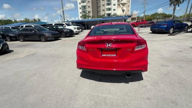 2012 Red Honda Civic Cpe (2HGFG4A50CH) with an 4 2.4L engine, Manual transmission, located at 27610 S Dixie Hwy, Homestead, FL, 33032, (305) 749-2348, 25.510241, -80.438301 - KBB.com Brand Image Awards. Only 105,663 Miles! Scores 31 Highway MPG and 22 City MPG! This Honda Civic Cpe delivers a Gas I4 2.4L/144 engine powering this Manual transmission. Vehicle Stability Assist (VSA) w/traction control, Variable intermittent windshield wipers, USB audio interface.*This Honda - Photo#4