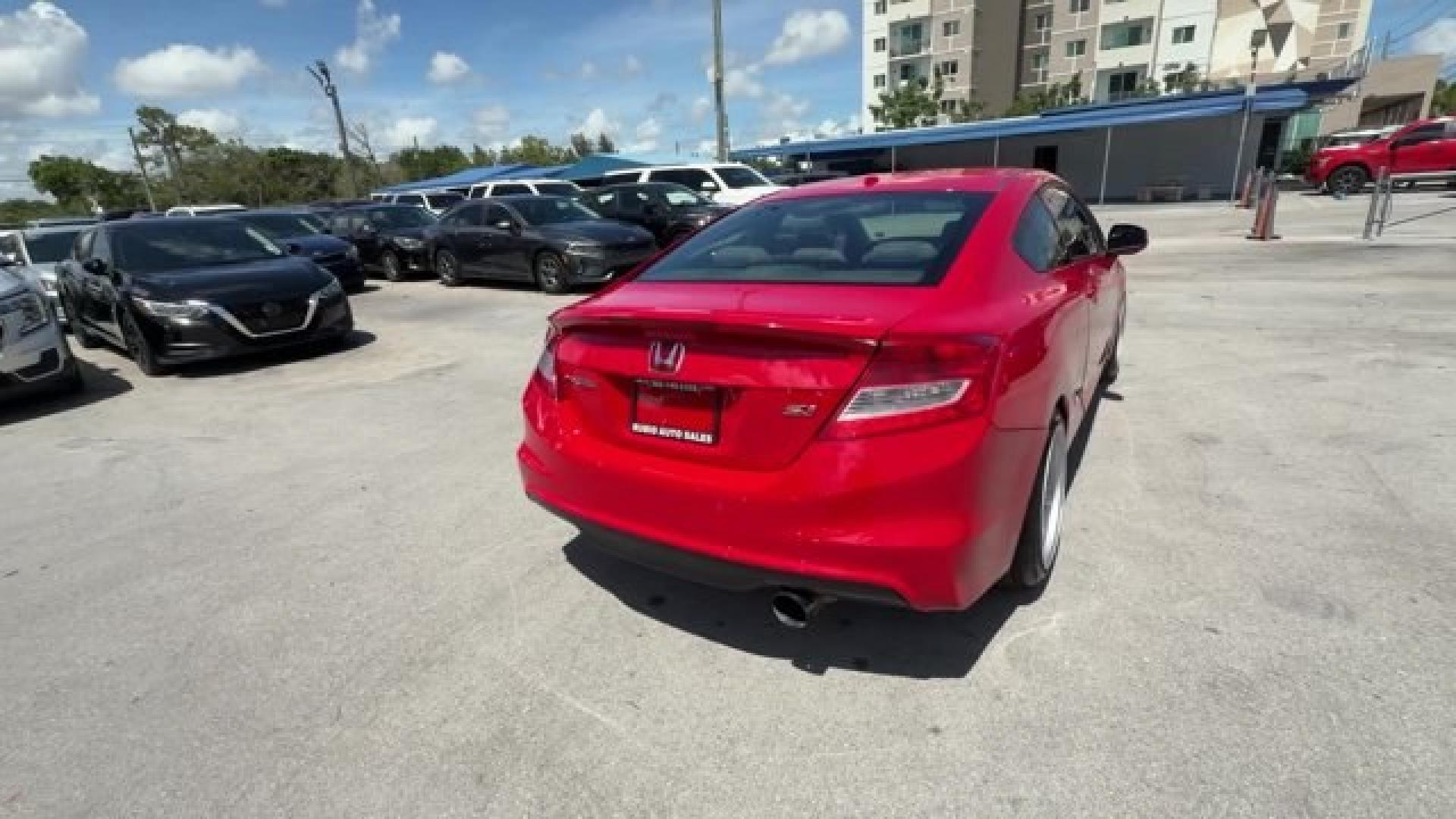 2012 Red Honda Civic Cpe (2HGFG4A50CH) with an 4 2.4L engine, Manual transmission, located at 27610 S Dixie Hwy, Homestead, FL, 33032, (305) 749-2348, 25.510241, -80.438301 - KBB.com Brand Image Awards. Only 105,663 Miles! Scores 31 Highway MPG and 22 City MPG! This Honda Civic Cpe delivers a Gas I4 2.4L/144 engine powering this Manual transmission. Vehicle Stability Assist (VSA) w/traction control, Variable intermittent windshield wipers, USB audio interface.*This Honda- Photo#5