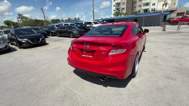 2012 Red Honda Civic Cpe (2HGFG4A50CH) with an 4 2.4L engine, Manual transmission, located at 27610 S Dixie Hwy, Homestead, FL, 33032, (305) 749-2348, 25.510241, -80.438301 - KBB.com Brand Image Awards. Only 105,663 Miles! Scores 31 Highway MPG and 22 City MPG! This Honda Civic Cpe delivers a Gas I4 2.4L/144 engine powering this Manual transmission. Vehicle Stability Assist (VSA) w/traction control, Variable intermittent windshield wipers, USB audio interface.*This Honda - Photo#5