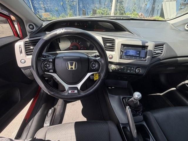 2012 Red Honda Civic Cpe (2HGFG4A50CH) with an 4 2.4L engine, Manual transmission, located at 27610 S Dixie Hwy, Homestead, FL, 33032, (305) 749-2348, 25.510241, -80.438301 - KBB.com Brand Image Awards. Only 105,663 Miles! Scores 31 Highway MPG and 22 City MPG! This Honda Civic Cpe delivers a Gas I4 2.4L/144 engine powering this Manual transmission. Vehicle Stability Assist (VSA) w/traction control, Variable intermittent windshield wipers, USB audio interface.*This Honda - Photo#7