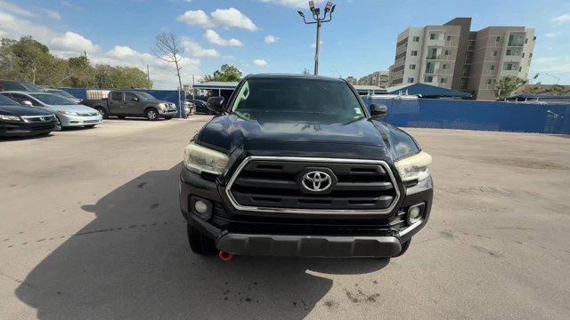 2016 Black Toyota Tacoma (5TFAZ5CNXGX) with an 6 3.5 L engine, Automatic transmission, located at 27610 S Dixie Hwy, Homestead, FL, 33032, (305) 749-2348, 25.510241, -80.438301 - KBB.com Best Resale Value Awards. Delivers 24 Highway MPG and 19 City MPG! This Toyota Tacoma delivers a Regular Unleaded V-6 3.5 L/211 engine powering this Automatic transmission. Variable Intermittent Wipers, Trip Computer, Transmission: 6-Speed Automatic -inc: electronic shift and gated shifter.* - Photo#7
