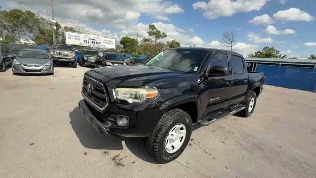 2016 Black Toyota Tacoma (5TFAZ5CNXGX) with an 6 3.5 L engine, Automatic transmission, located at 27610 S Dixie Hwy, Homestead, FL, 33032, (305) 749-2348, 25.510241, -80.438301 - KBB.com Best Resale Value Awards. Delivers 24 Highway MPG and 19 City MPG! This Toyota Tacoma delivers a Regular Unleaded V-6 3.5 L/211 engine powering this Automatic transmission. Variable Intermittent Wipers, Trip Computer, Transmission: 6-Speed Automatic -inc: electronic shift and gated shifter.* - Photo#0