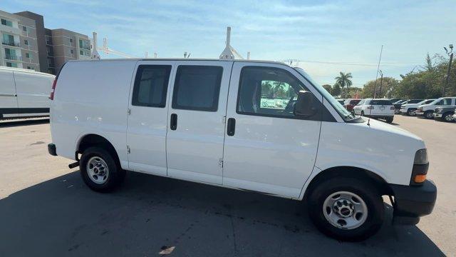 2019 Summit White /Medium Pewter GMC Savana Cargo Van (1GTW7AFG0K1) with an 8 6.0L engine, Automatic transmission, located at 27610 S Dixie Hwy, Homestead, FL, 33032, (305) 749-2348, 25.510241, -80.438301 - This GMC Savana Cargo Van boasts a Gas/Ethanol V8 6.0L/364 engine powering this Automatic transmission. WINDOW SECURITY BAR, REAR SIDE DOOR GLASS, VISORS, DRIVER AND FRONT PASSENGER vinyl in lieu of standard cloth, TRANSMISSION, 6-SPEED AUTOMATIC, HEAVY-DUTY, ELECTRONICALLY CONTROLLED with overdrive - Photo#5