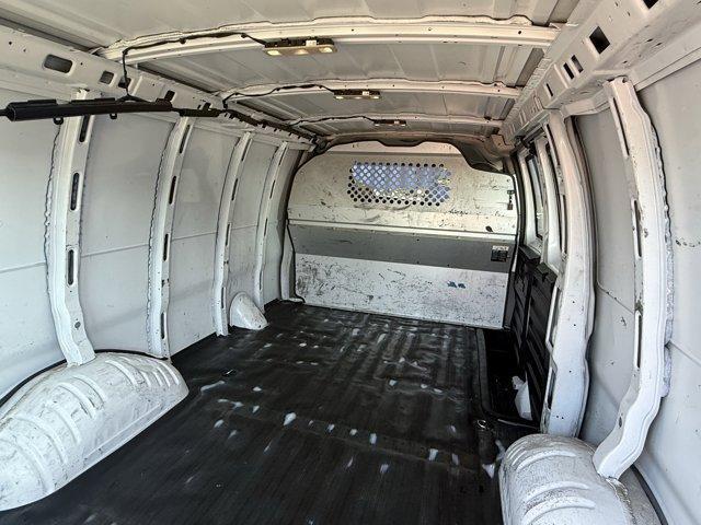 2019 Summit White /Medium Pewter GMC Savana Cargo Van (1GTW7AFG0K1) with an 8 6.0L engine, Automatic transmission, located at 27610 S Dixie Hwy, Homestead, FL, 33032, (305) 749-2348, 25.510241, -80.438301 - This GMC Savana Cargo Van boasts a Gas/Ethanol V8 6.0L/364 engine powering this Automatic transmission. WINDOW SECURITY BAR, REAR SIDE DOOR GLASS, VISORS, DRIVER AND FRONT PASSENGER vinyl in lieu of standard cloth, TRANSMISSION, 6-SPEED AUTOMATIC, HEAVY-DUTY, ELECTRONICALLY CONTROLLED with overdrive - Photo#14