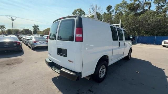 2019 Summit White /Medium Pewter GMC Savana Cargo Van (1GTW7AFG0K1) with an 8 6.0L engine, Automatic transmission, located at 27610 S Dixie Hwy, Homestead, FL, 33032, (305) 749-2348, 25.510241, -80.438301 - This GMC Savana Cargo Van boasts a Gas/Ethanol V8 6.0L/364 engine powering this Automatic transmission. WINDOW SECURITY BAR, REAR SIDE DOOR GLASS, VISORS, DRIVER AND FRONT PASSENGER vinyl in lieu of standard cloth, TRANSMISSION, 6-SPEED AUTOMATIC, HEAVY-DUTY, ELECTRONICALLY CONTROLLED with overdrive - Photo#4