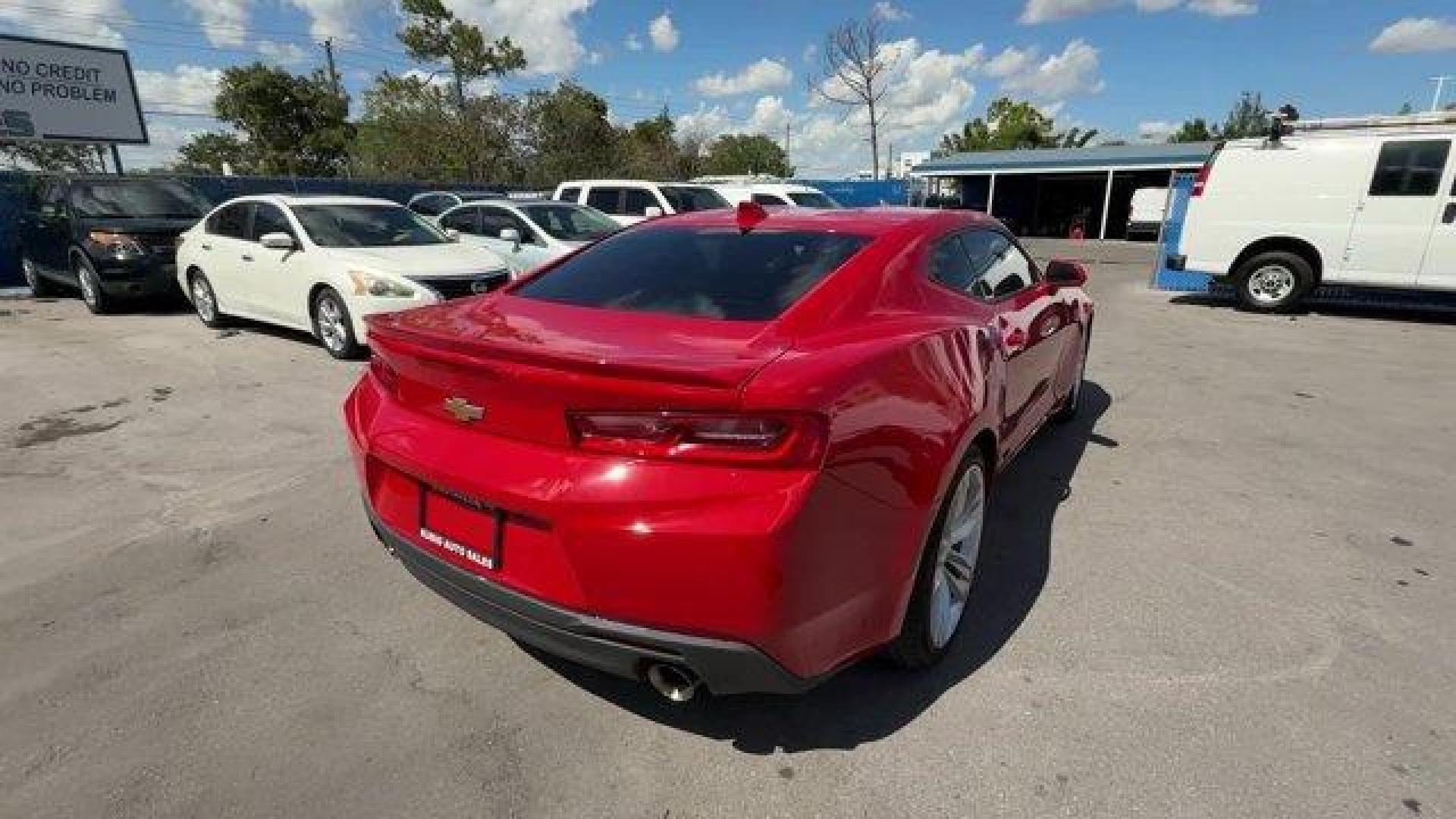 2016 Red Hot /Jet Black Chevrolet Camaro (1G1FB1RS9G0) with an 6 3.6L engine, Automatic transmission, located at 27610 S Dixie Hwy, Homestead, FL, 33032, (305) 749-2348, 25.510241, -80.438301 - Ward's 10 Best Engines. Only 96,129 Miles! Delivers 28 Highway MPG and 18 City MPG! This Chevrolet Camaro delivers a Gas V6 3.6L/222 engine powering this Automatic transmission. WHEELS, 20 (50.8 CM) 5-SPLIT SPOKE BRIGHT SILVER-PAINTED ALUMINUM, TRANSMISSION, 8-SPEED AUTOMATIC includes transmission o - Photo#4