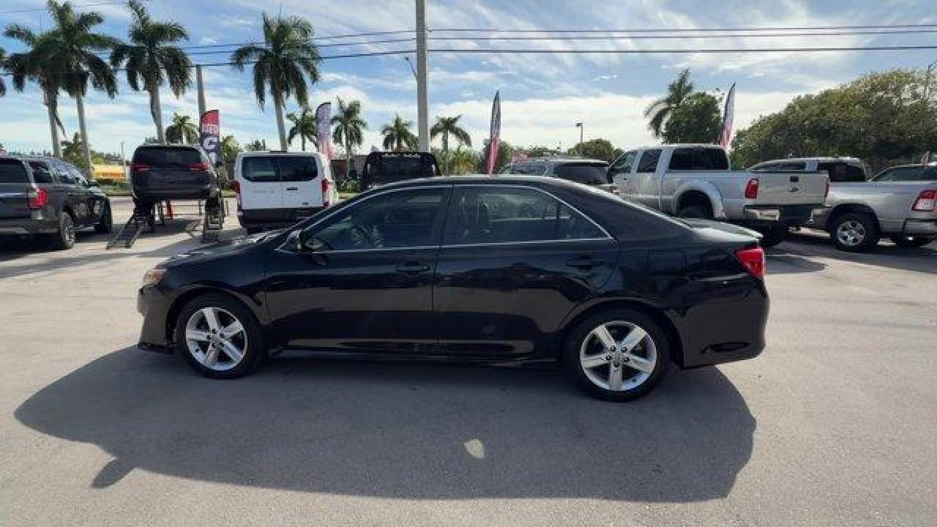 2014 Black Toyota Camry (4T1BF1FK1EU) with an 4 2.5 L engine, Automatic transmission, located at 27610 S Dixie Hwy, Homestead, FL, 33032, (305) 749-2348, 25.510241, -80.438301 - KBB.com 10 Best Hybrid Cars Under $30,000. Only 101,356 Miles! Delivers 35 Highway MPG and 25 City MPG! This Toyota Camry delivers a Regular Unleaded I-4 2.5 L/152 engine powering this Automatic transmission. Window Grid Antenna, Valet Function, Trunk Rear Cargo Access.*This Toyota Camry Comes Equip - Photo#1